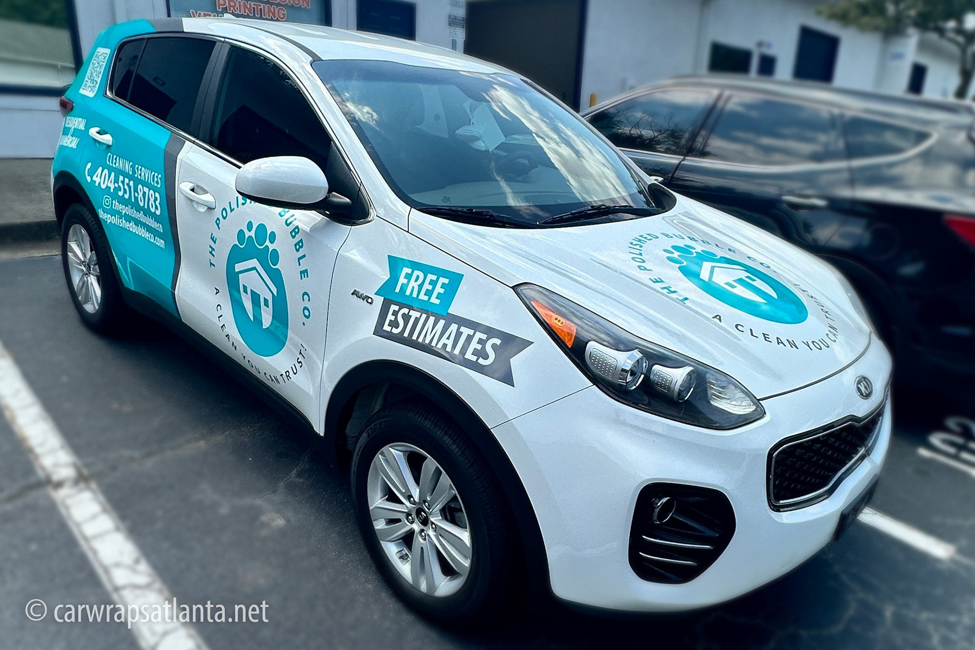Close-up of the sparkling bubble graphics and logo integration on the Kia Sorento partial wrap.