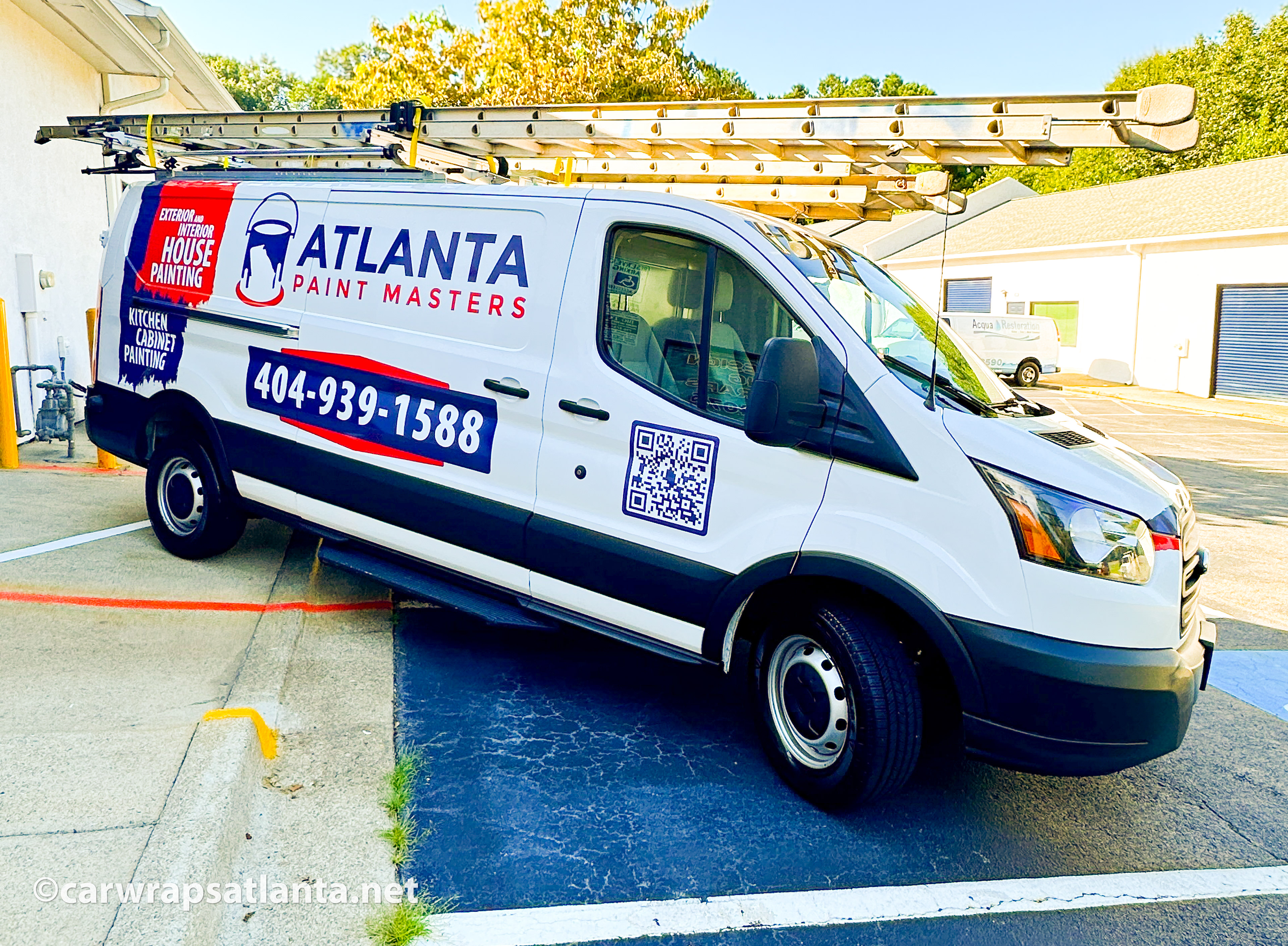 Hero image: Custom spot graphics applied to a Ford Transit van for a commercial painting company in Atlanta, GA.