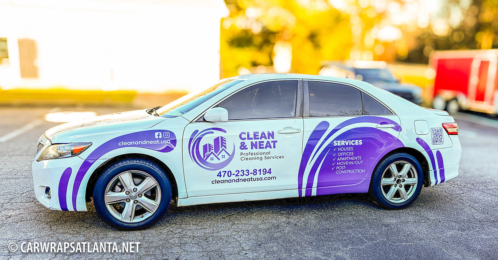 Hero image: Stunning partial wrap on a Toyota Camry sedan for Clean and Neat cleaning service in Atlanta, GA.