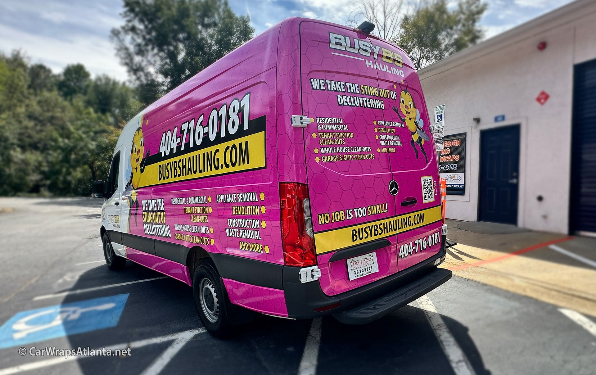 Final result of the full Mercedes-Benz Sprinter van wrap parked in an Atlanta urban setting.