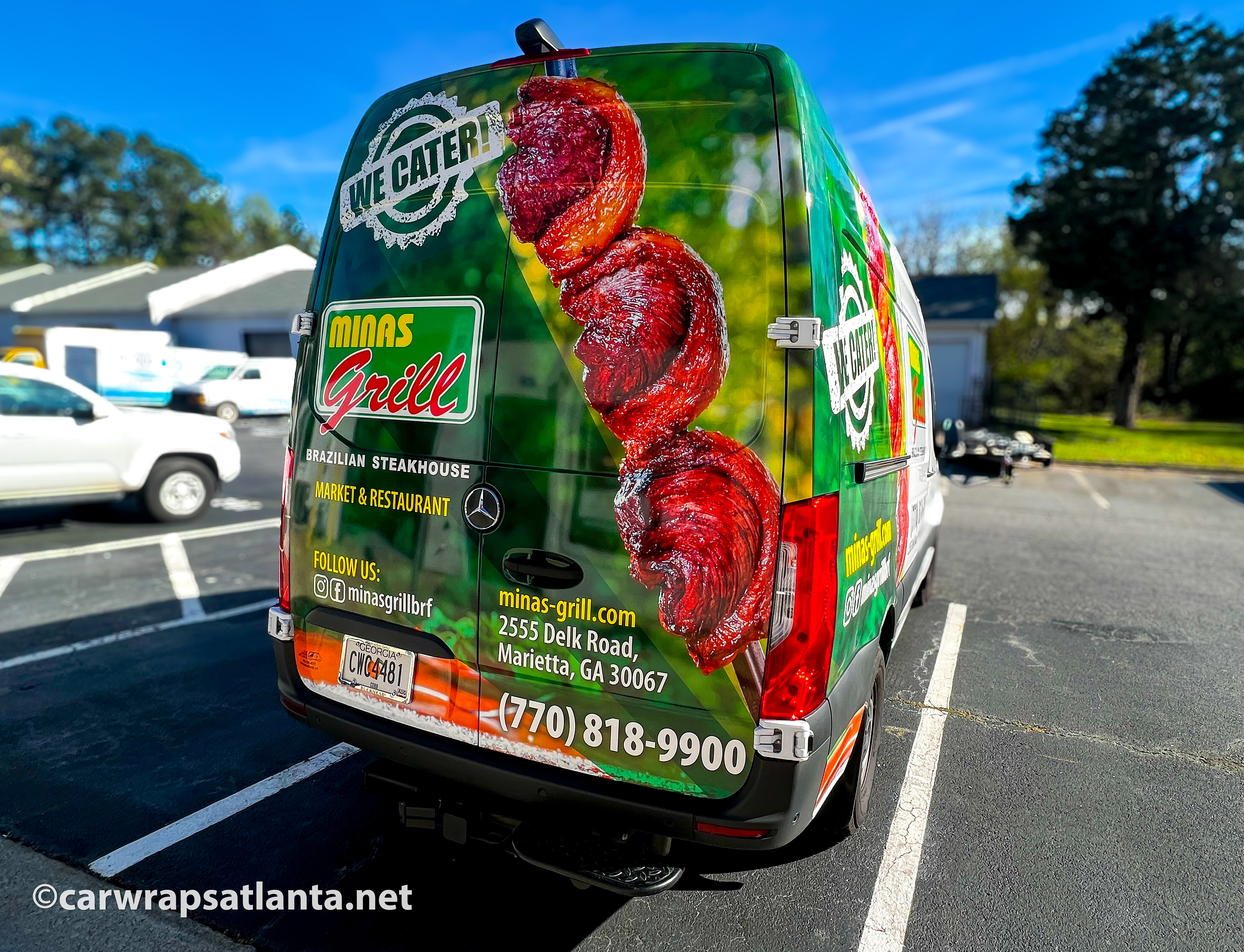 Rear view of the Sprinter Van partial wrap demonstrating effective food service advertisement in Marietta.