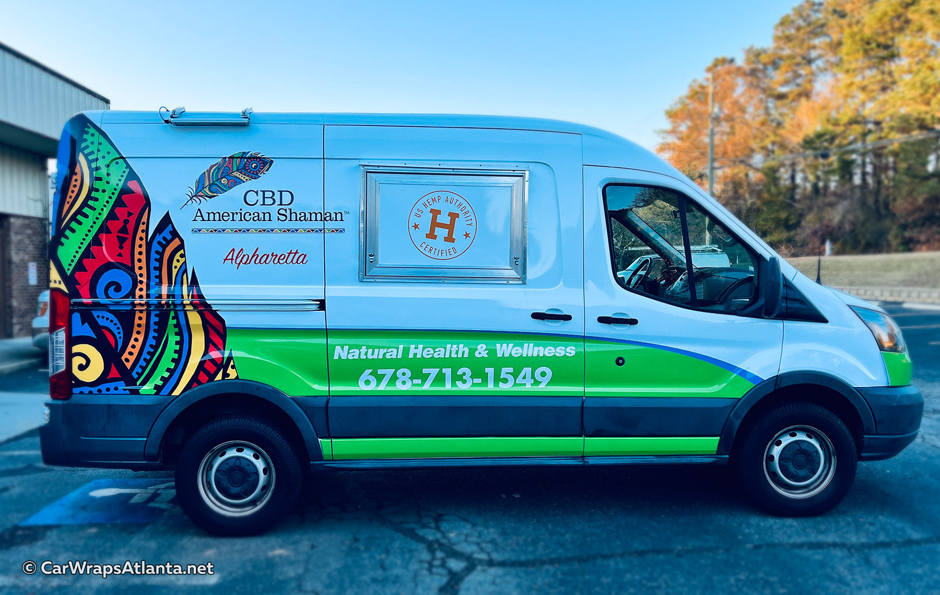 Hero image: Full commercial wrap on a Ford Transit van for CBD American Shaman in Atlanta, GA.