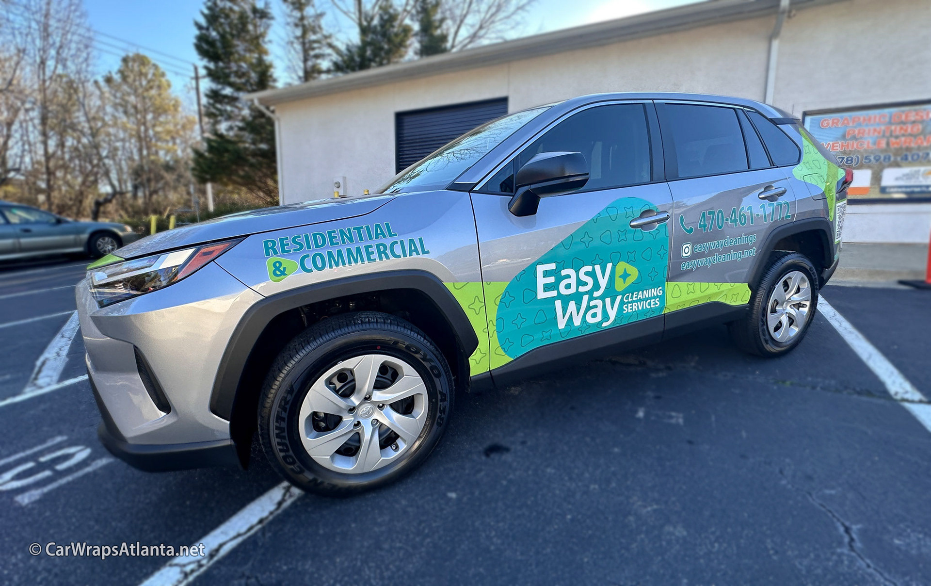 Professional installation detail of the spot graphics on the Toyota RAV4 demonstrating durability.