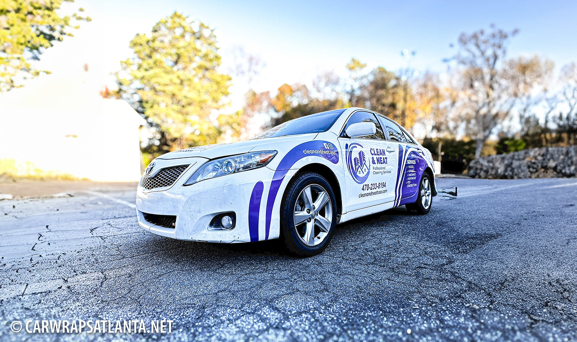 Close-up of logo and high-quality graphics detail on the Toyota Camry partial wrap.