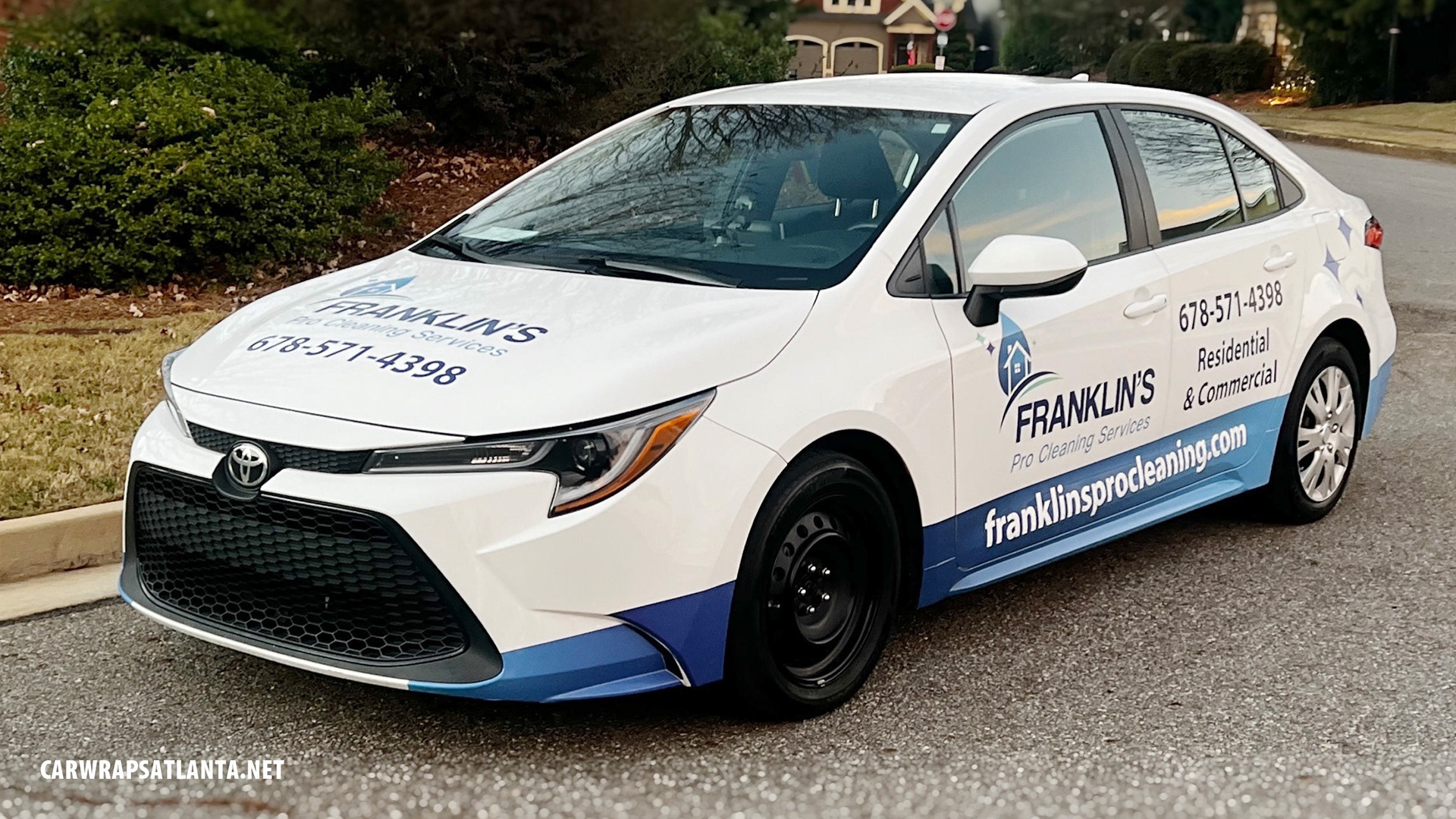 Custom partial vehicle wrap and spot graphics on a Toyota Corolla for a cleaning service in Atlanta, GA.