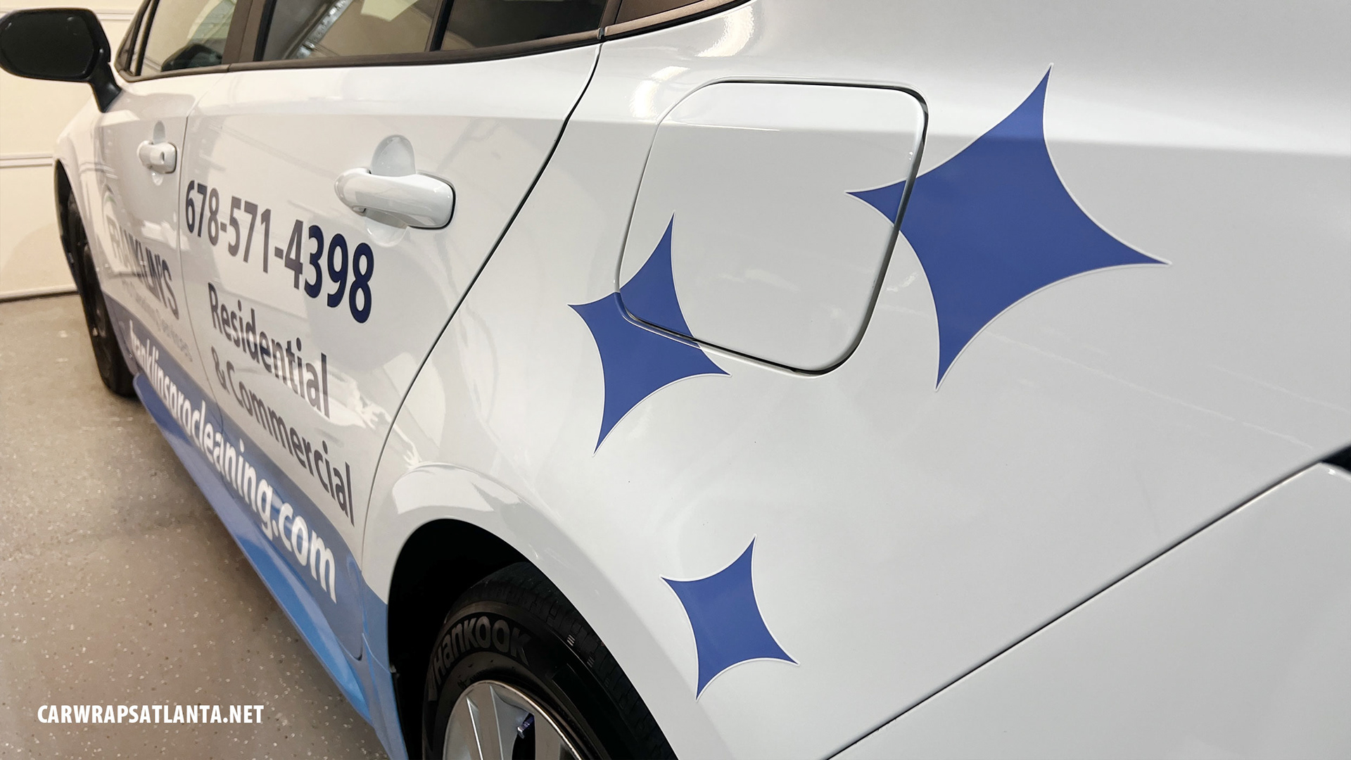 Detail of a spot graphics project on a Toyota Corolla in Atlanta, GA.