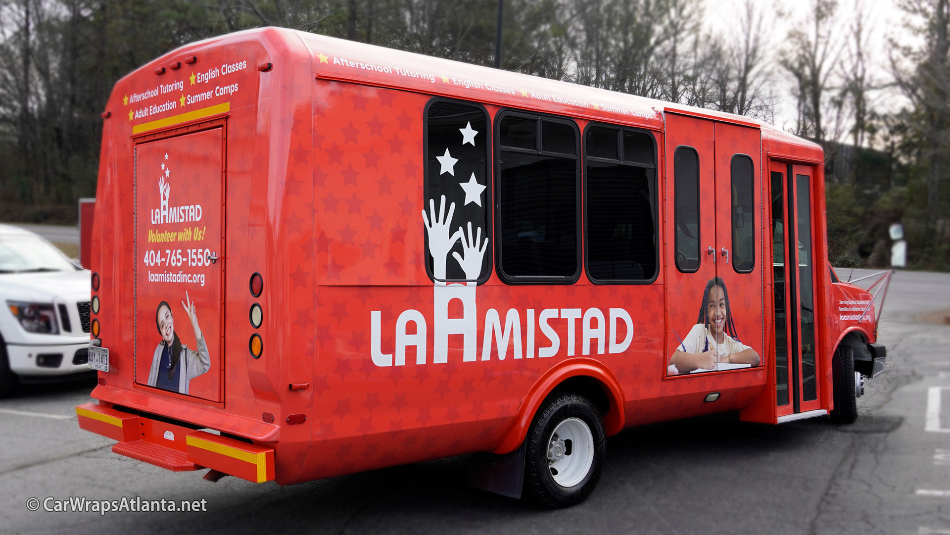 Custom graphics on the rear of the school bus wrap, ensuring visibility in traffic.