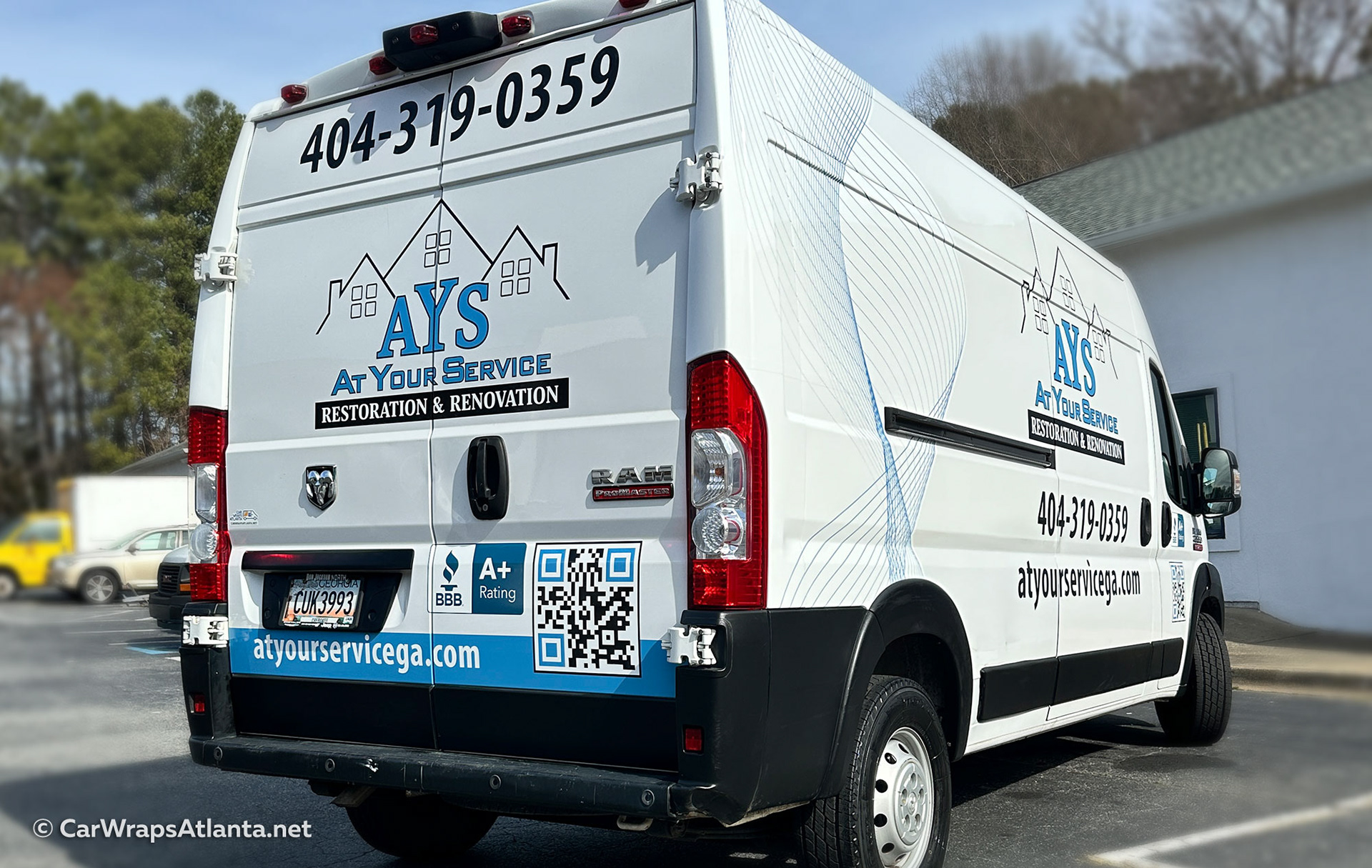 High-impact partial wrap using vinyl graphics on Ram ProMaster work van for Atlanta-based construction and restoration services