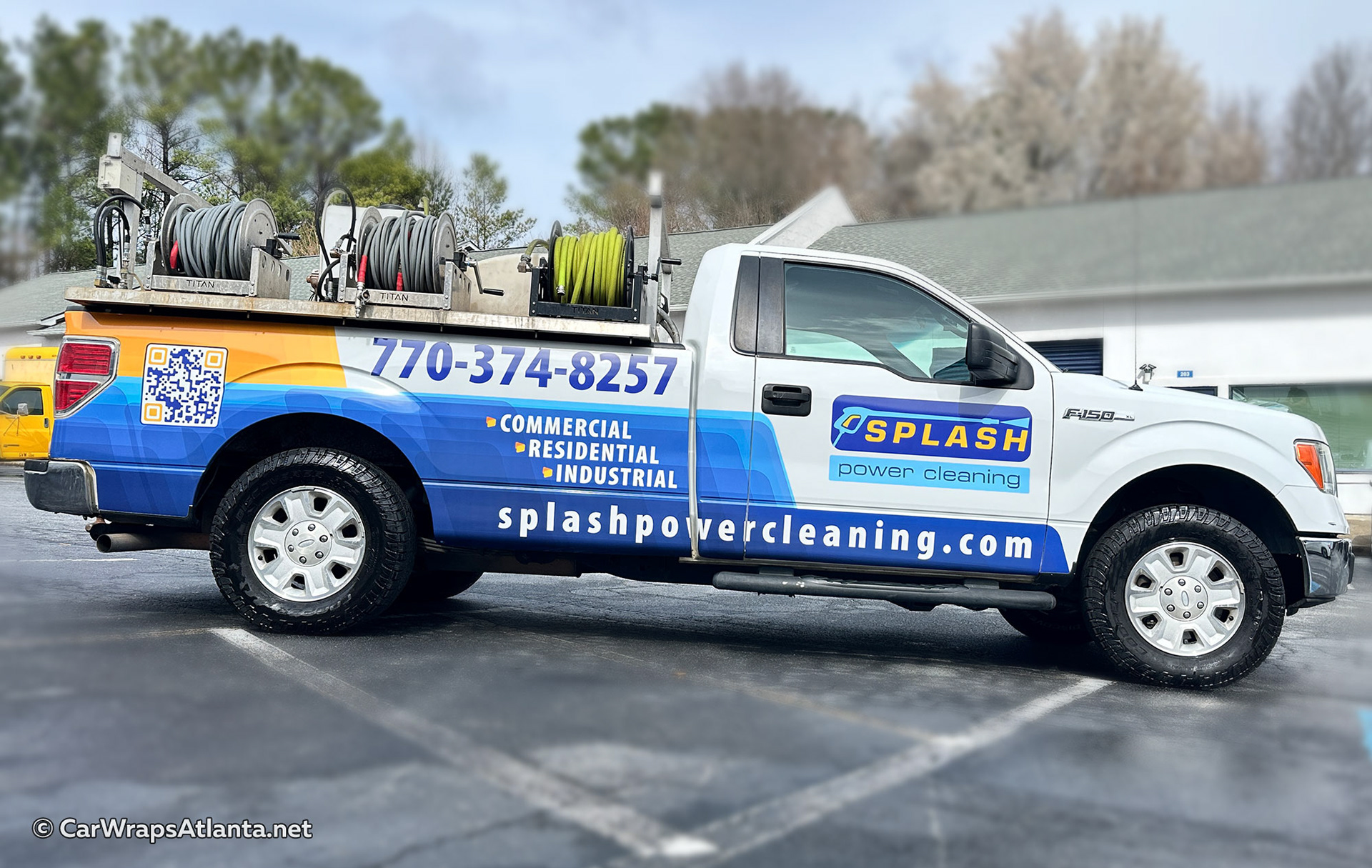 Partial vehicle wrap on Ford F-150 for Atlanta pressure washing company with bold custom graphics