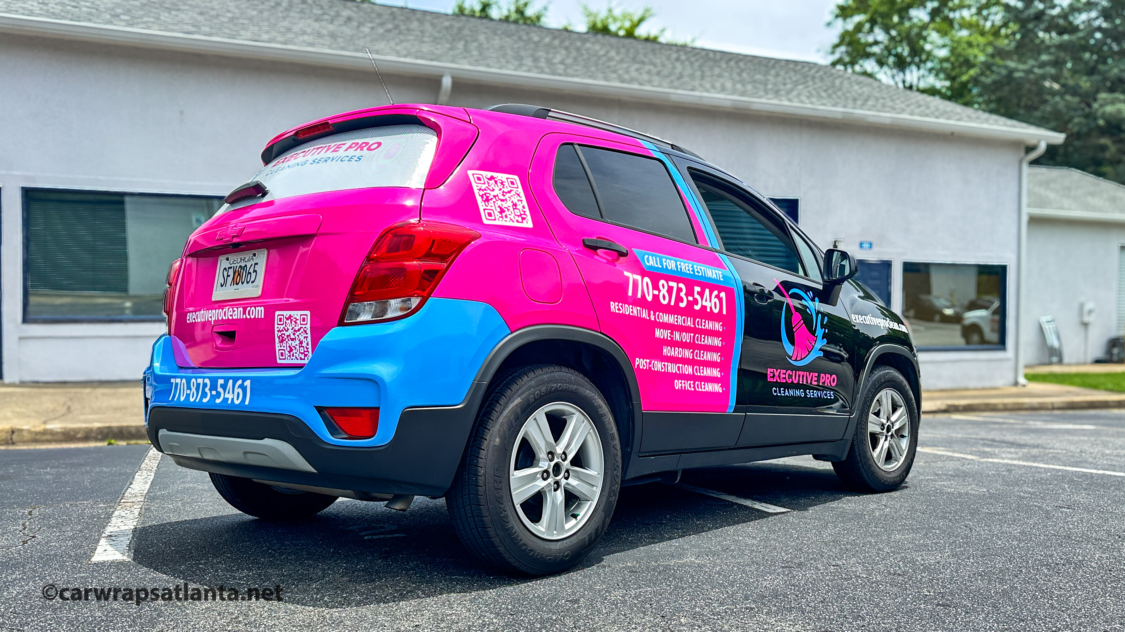 Close-up of the Chevrolet Trax partial wrap showing high-quality printing of the cleaning company logo.