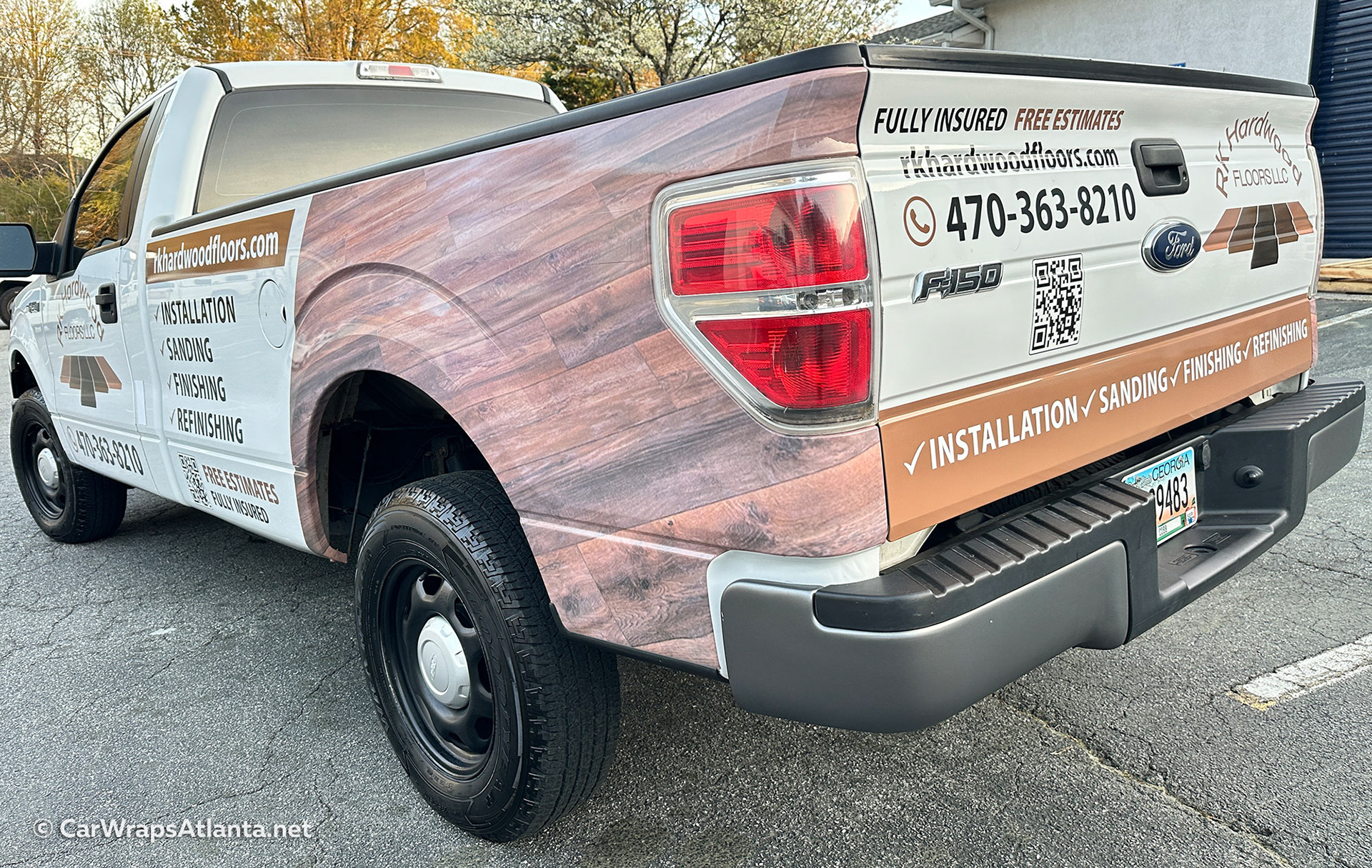 Professional vehicle graphics and partial truck wrap for flooring installation company in Atlanta