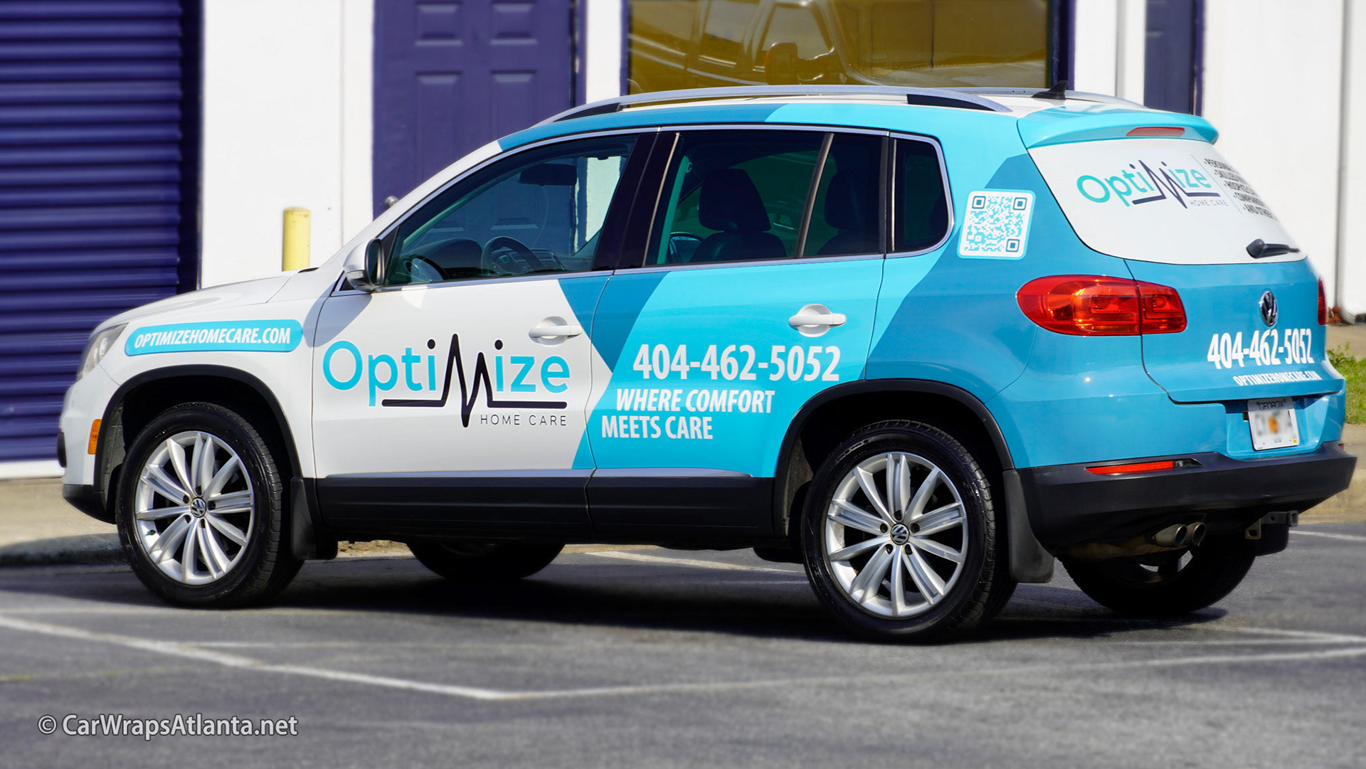 Close-up of the professional logo integration on the partial Volkswagen Tiguan wrap.