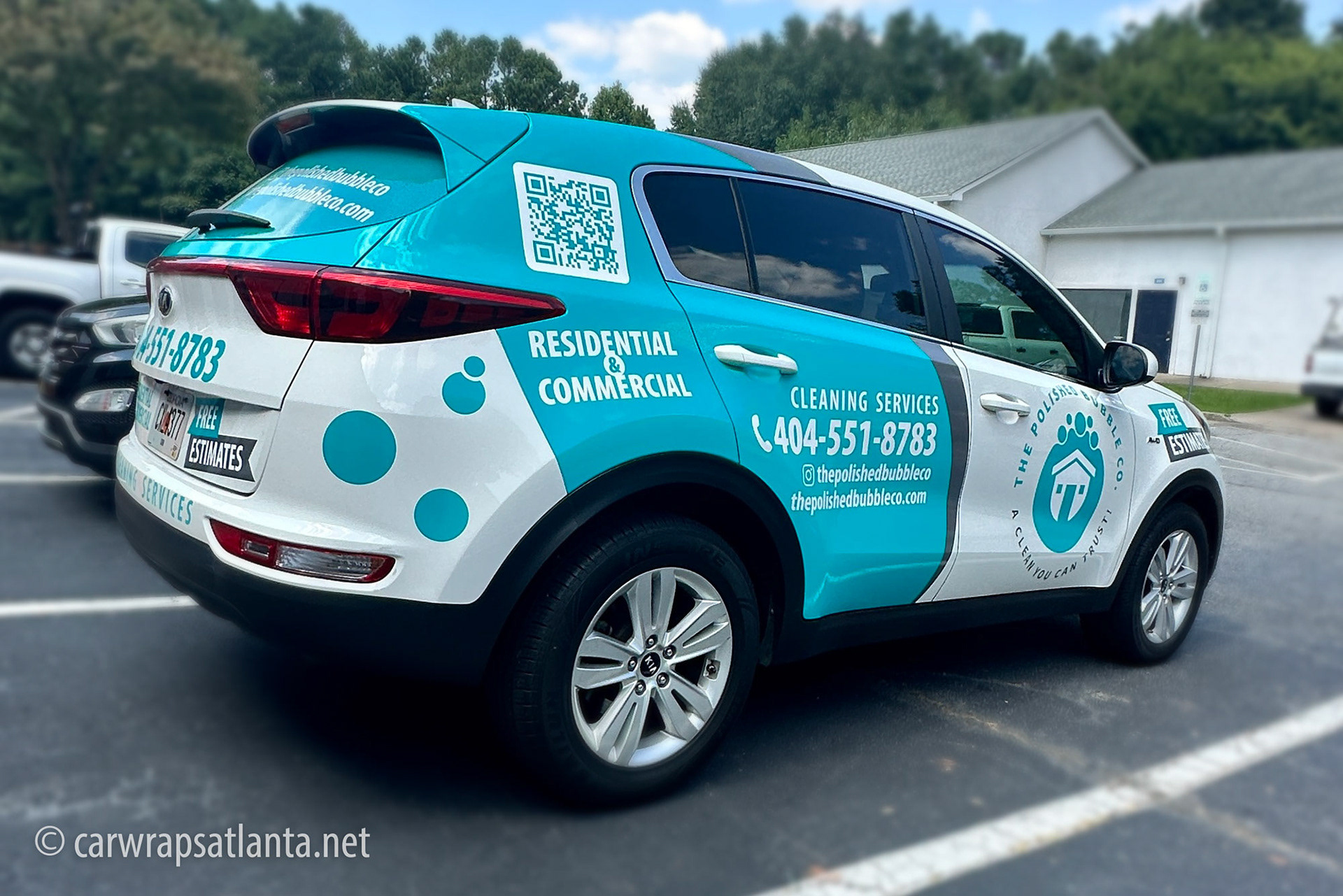 Full view of the professionally installed partial wrap on the Kia Sorento cleaning service vehicle in Atlanta.