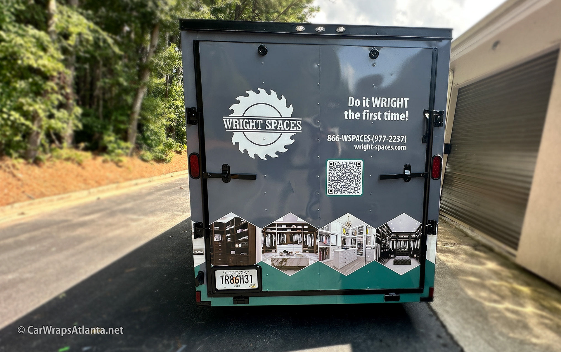 Custom full trailer wrap parked at a remodelling job site in the Atlanta metro area.