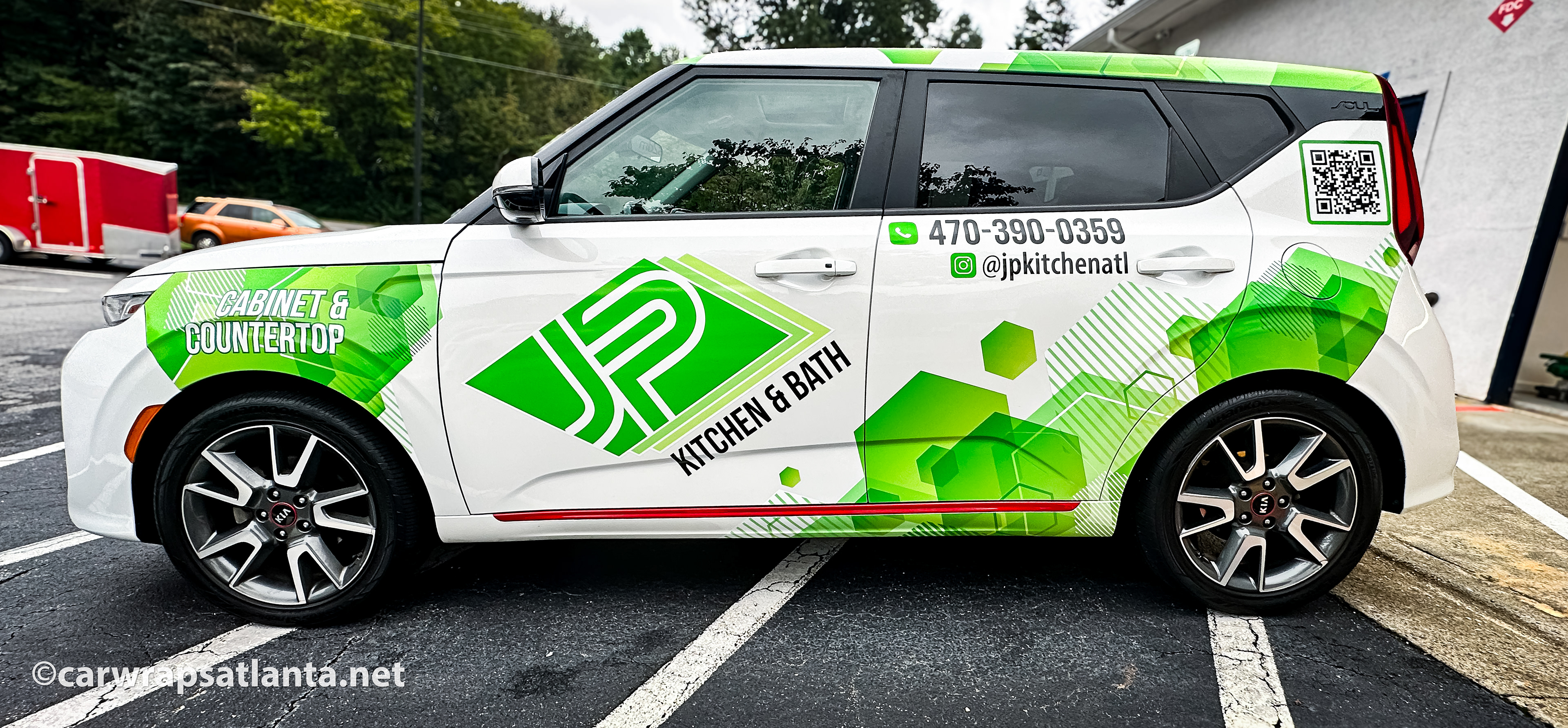 Hero image: Custom partial wrap on a Kia Soul SUV for a granite, countertops, and kitchen remodel company in Woodstock, GA.