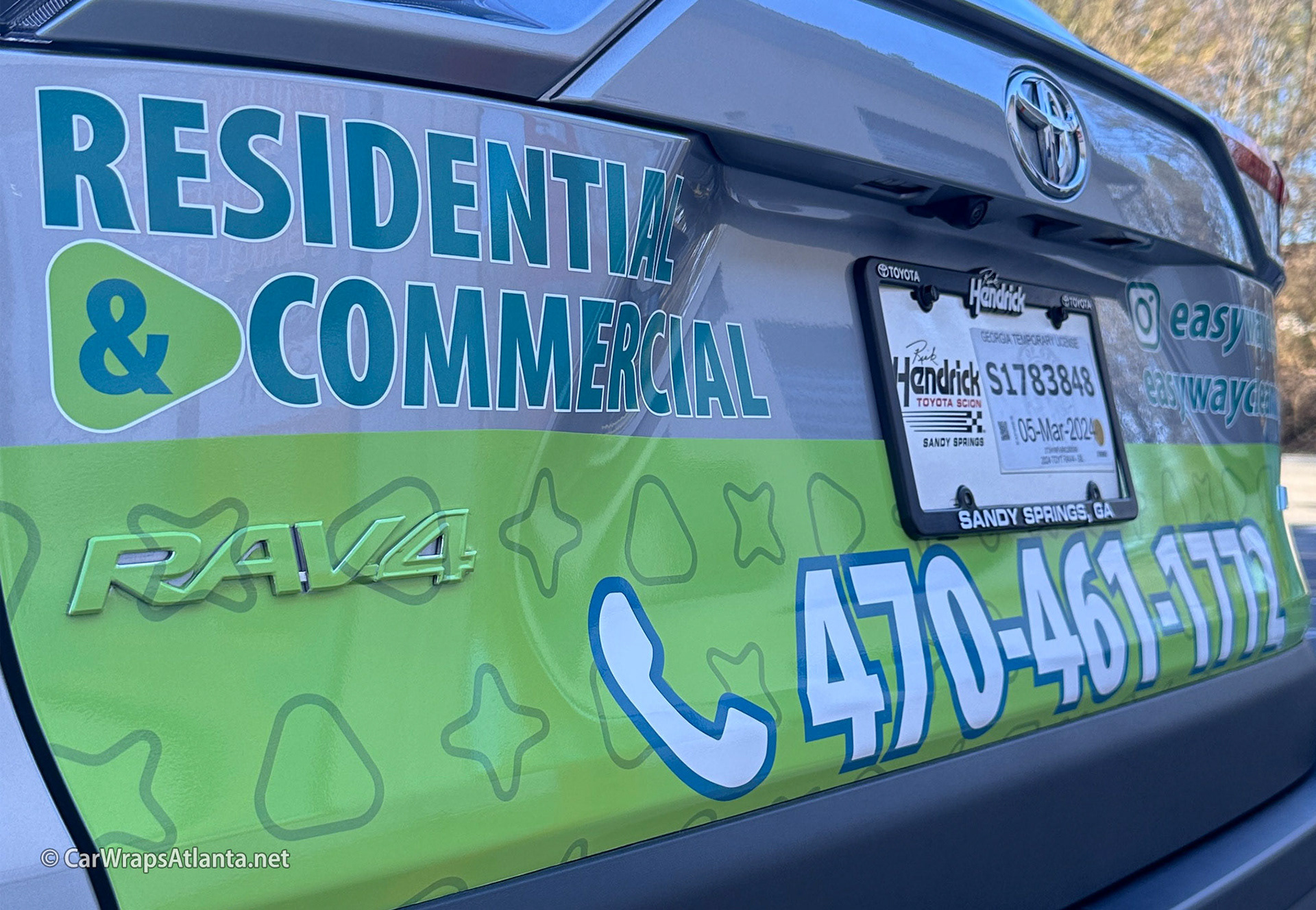 Close-up of eye-catching spot graphics and clear messaging on the Toyota RAV4 side panel.