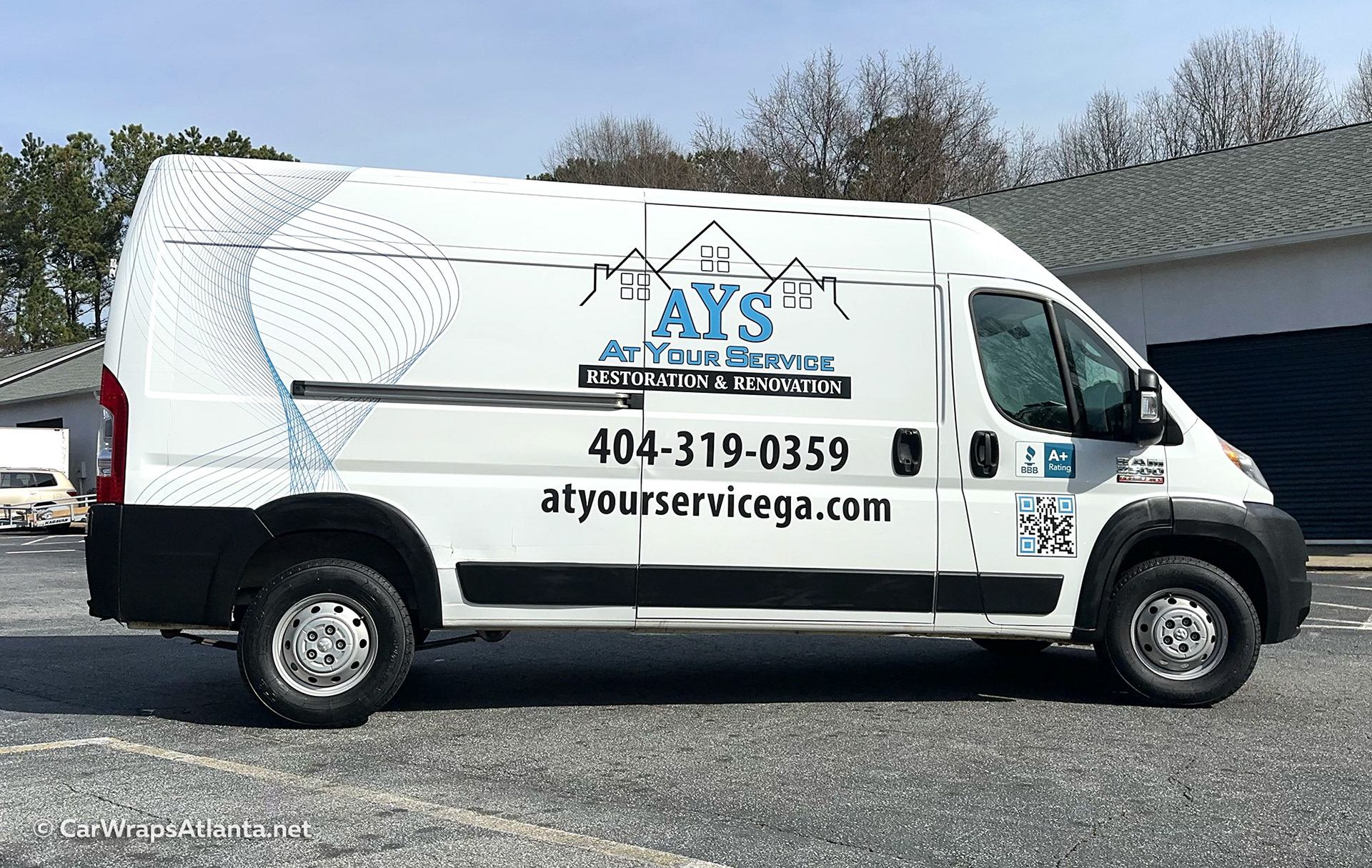 Partial vehicle wrap on Ram ProMaster for Atlanta restoration and renovation company with branded graphics and contact info