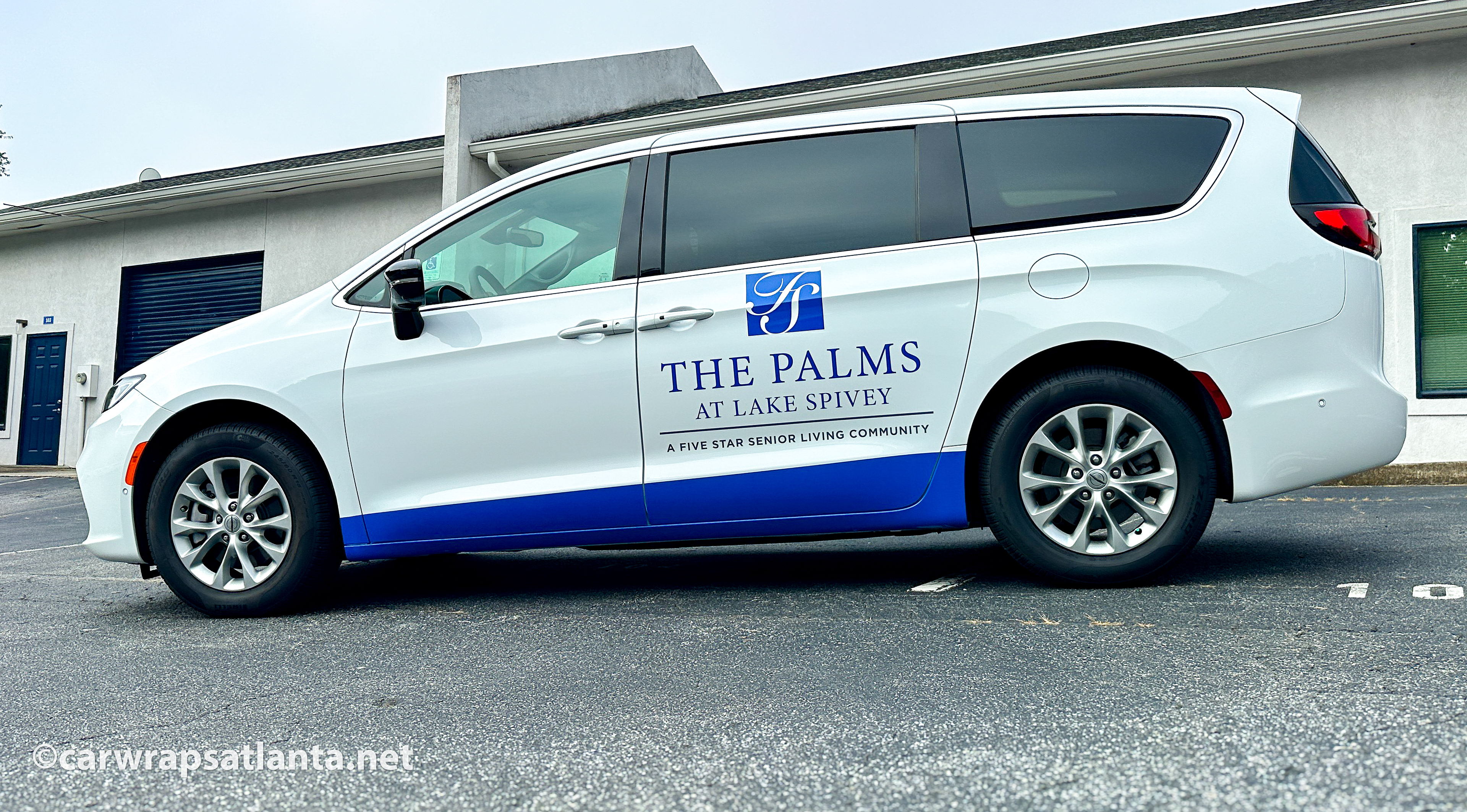 Hero image: Custom spot graphics on a Chrysler Pacifica van for a Senior Living Community located in Jonesboro, GA.
