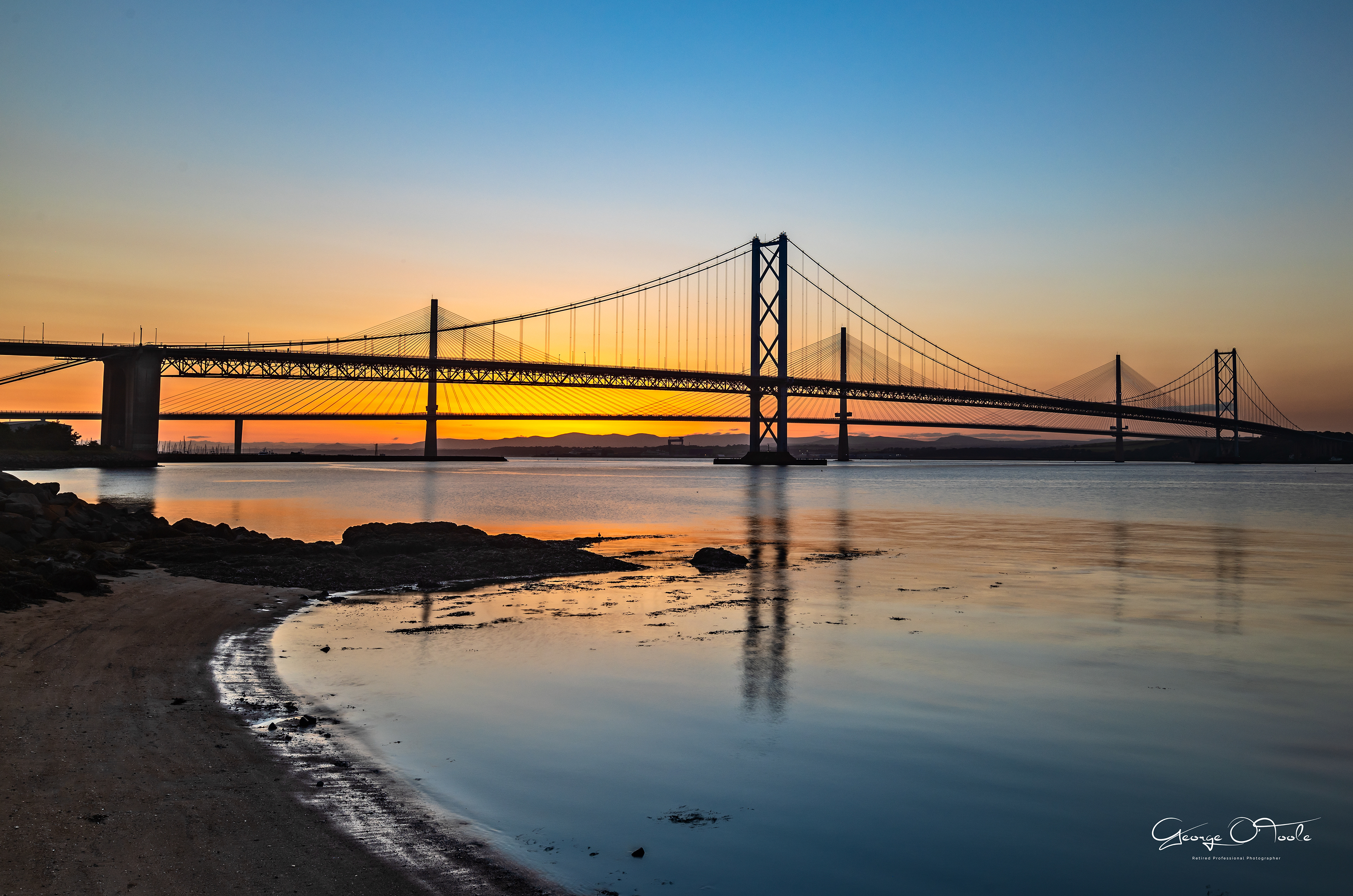 The Forth Road Bridge & Queensferry Crossing at Sunset.
