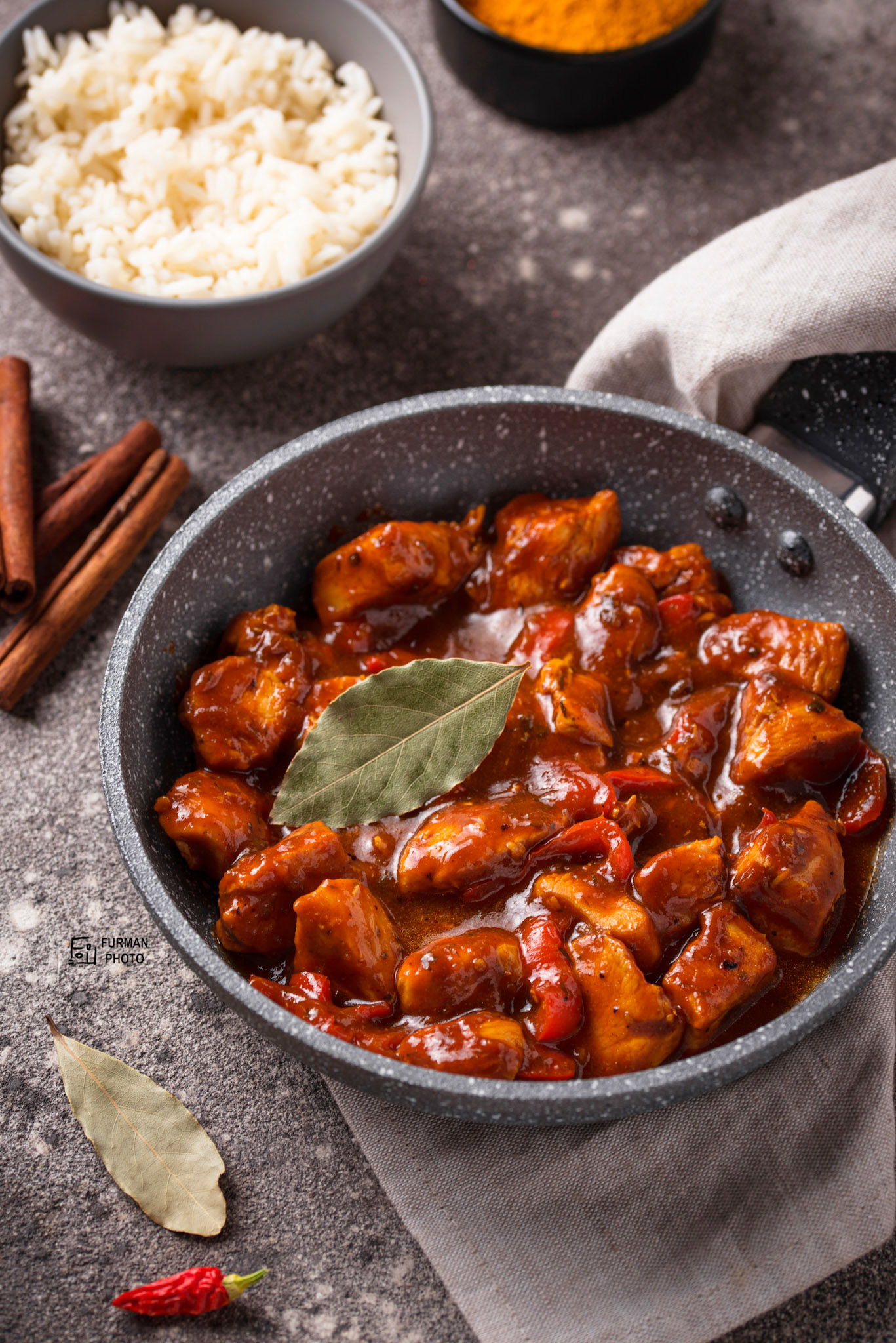 Curry chicken tikka masala with rice and spices