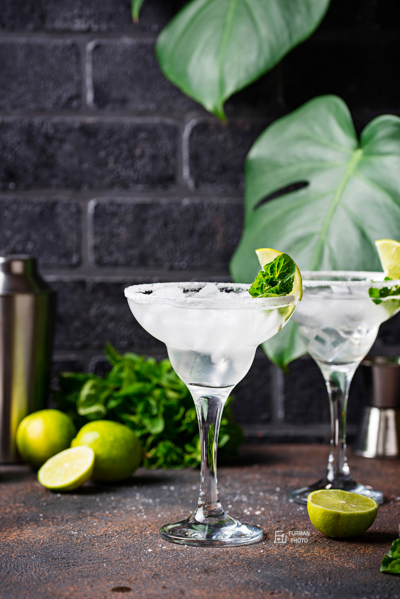 Traditional Margarita cocktail with lime and ice