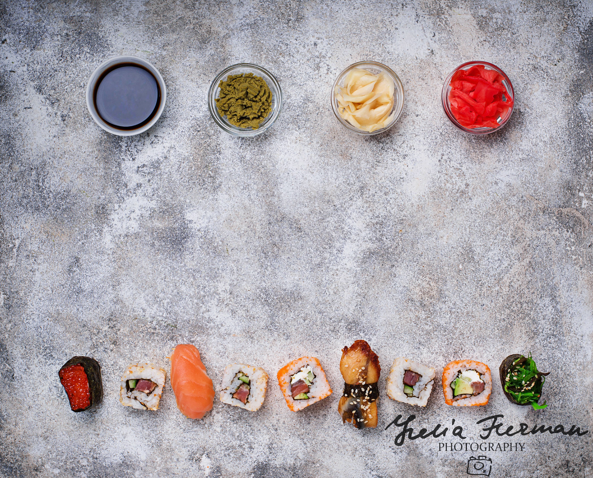 Sushi roll set with wasabi, ginger and soy sauce . Top view