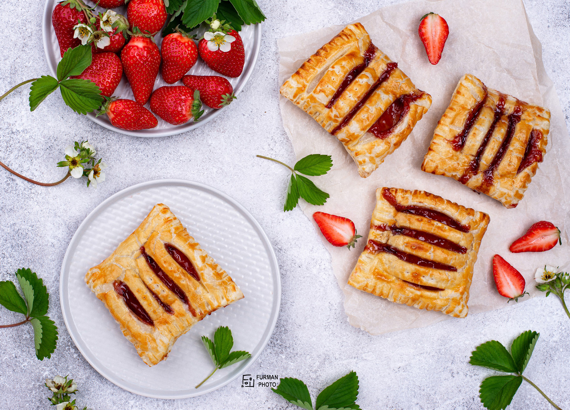Sweet puff pastry cakes with strawberry. Top view
