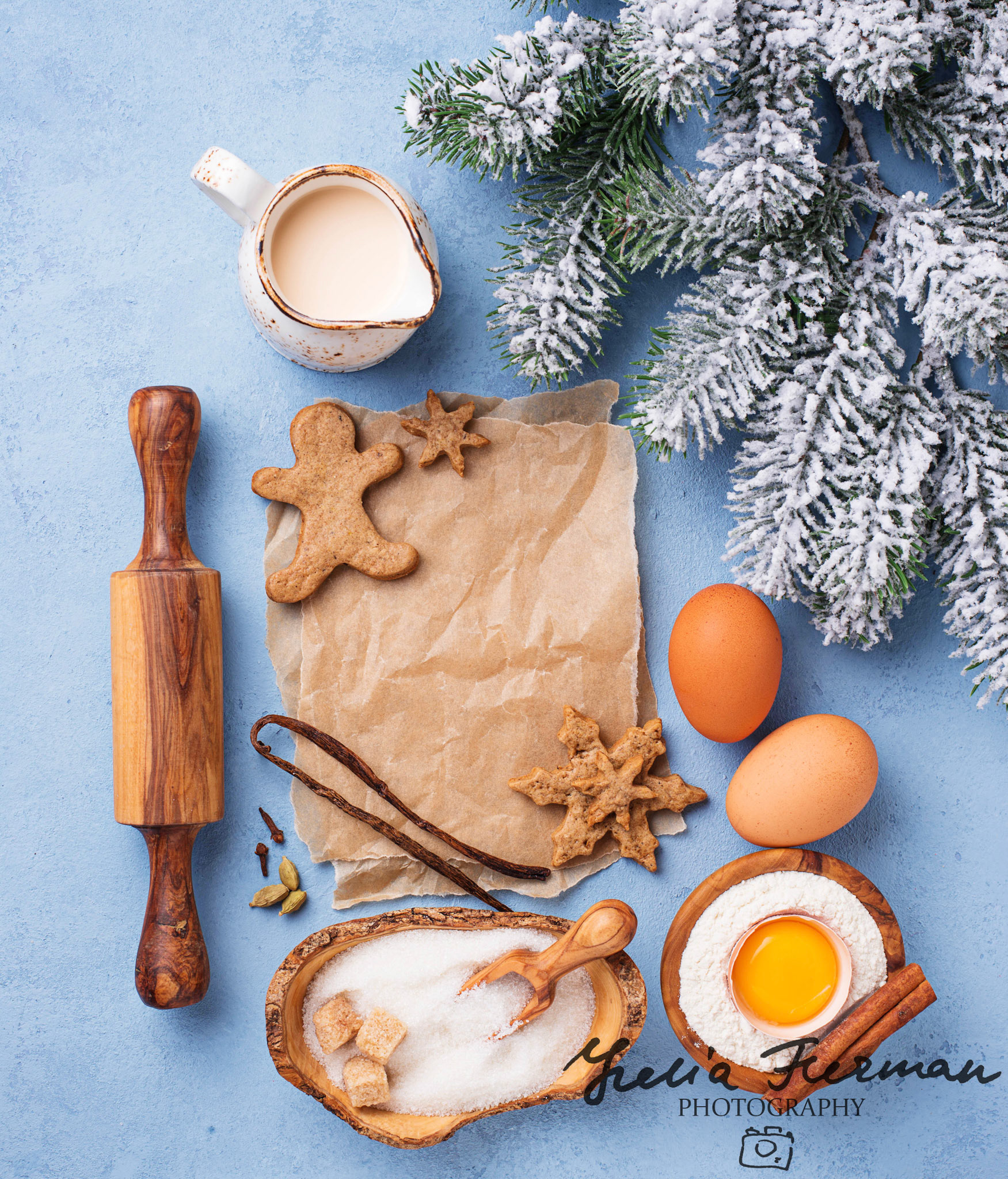Ingredients for baking Christmas cookies on blue background