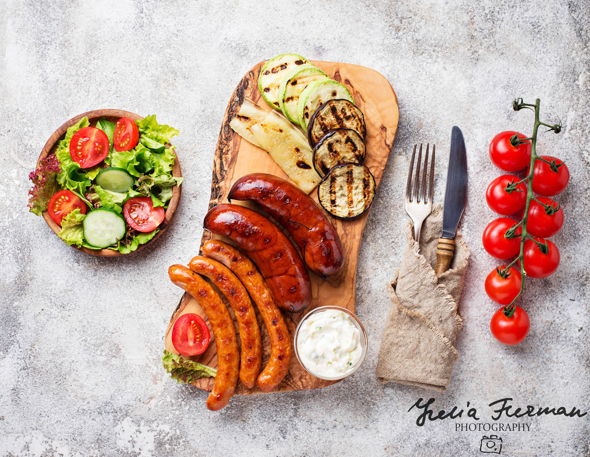 Assortment of grilled sausages and vegetables. Top view