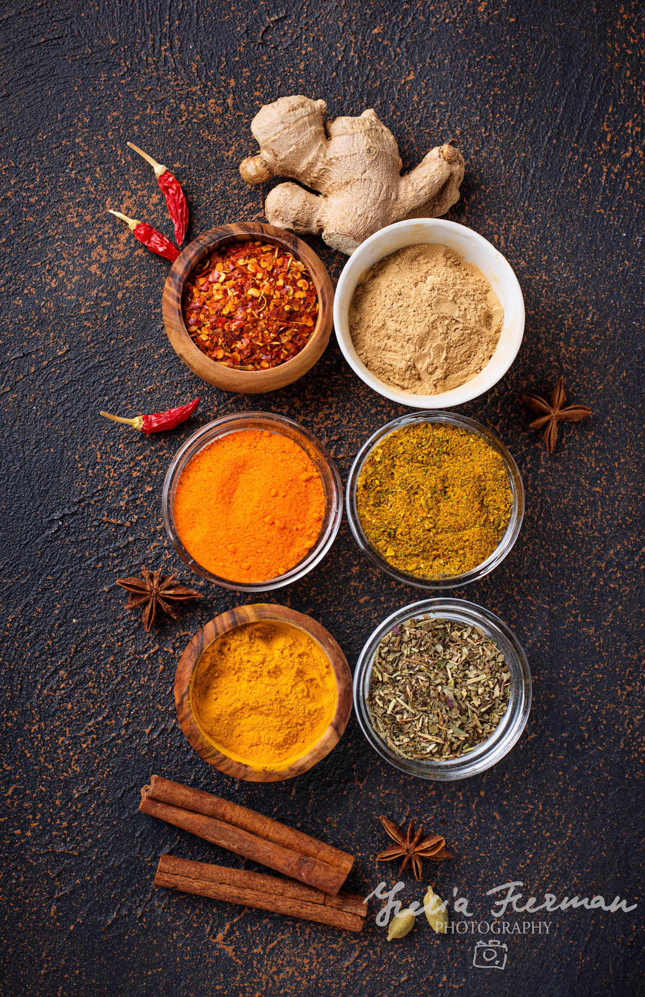 Traditional Indian spices. Turmeric, chili pepper, curry, ginger, dry herbs and saffron