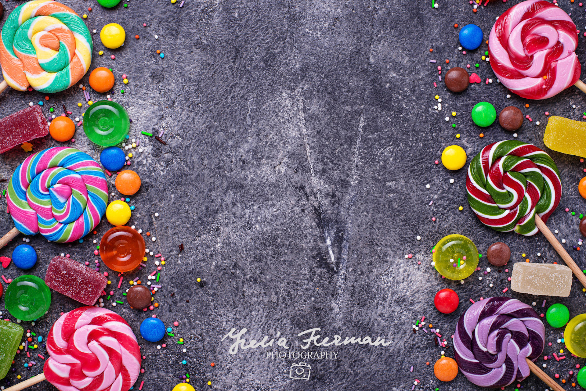 Assortment of colorful candies and lollipops. Sweet background