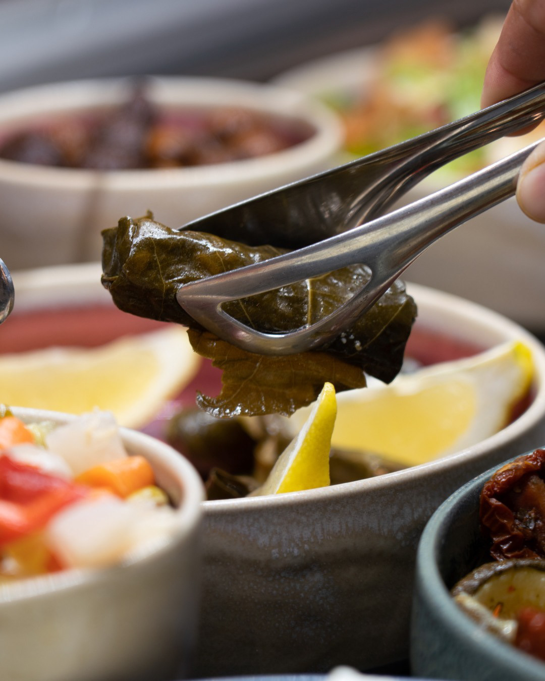Dolma. What is it you ask? Dolma is a popular Middle-East and European dish made by wrapping grape, cabbage, or other leaves around a delicious filling. Now, one of many new Summer Specials at Tyburn Market. #MakeitMeze β¨