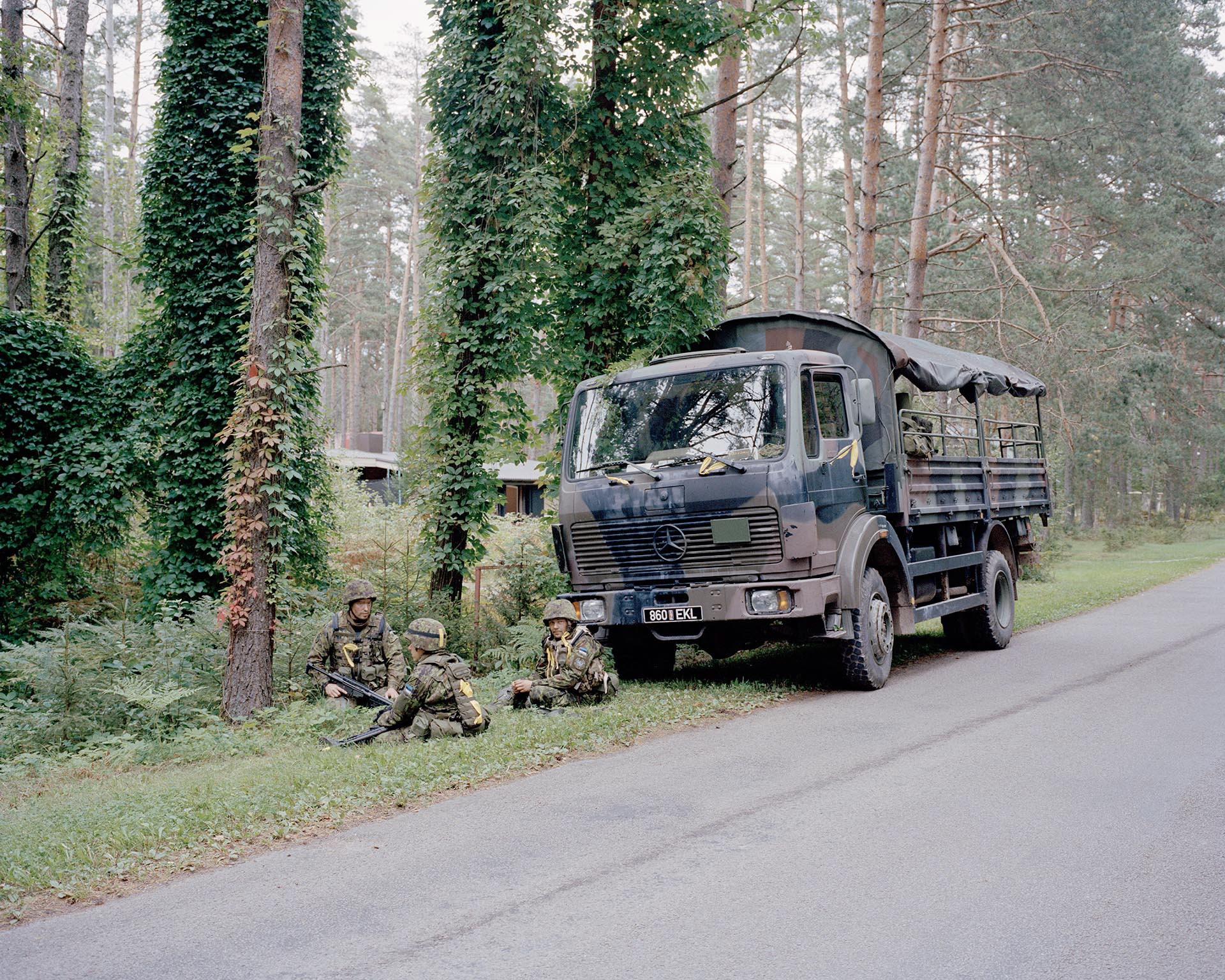 Soldiers of the Estonian Army during military training in the forest. Exercises are held quite often in order to keep the Army ready to defend the country from an attack by Russia, Uusküla