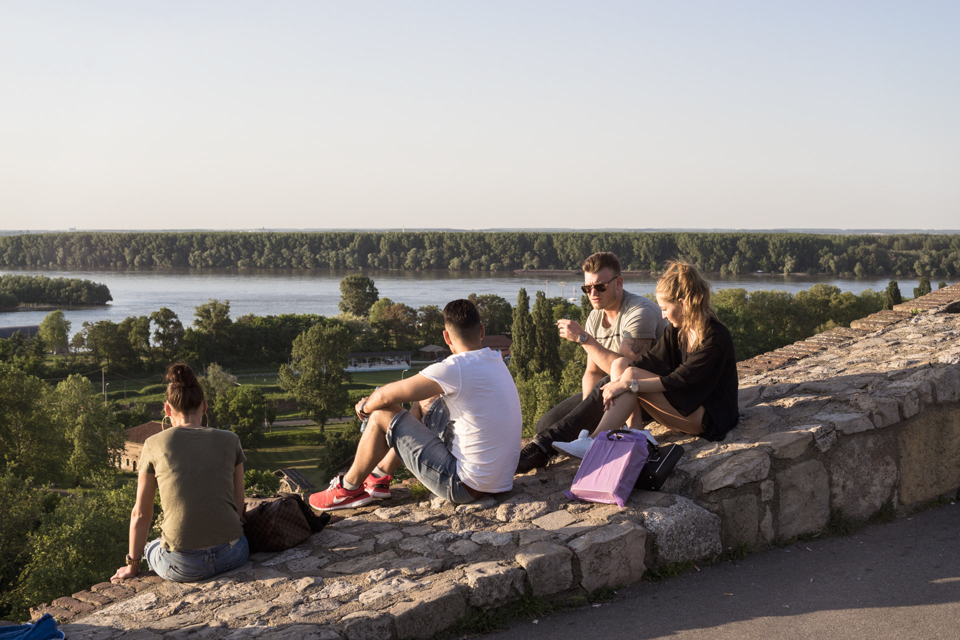 At sunset, a lot of young people gather on the wall of Kalemegdan Fortress, the most famous viewpoint of the city