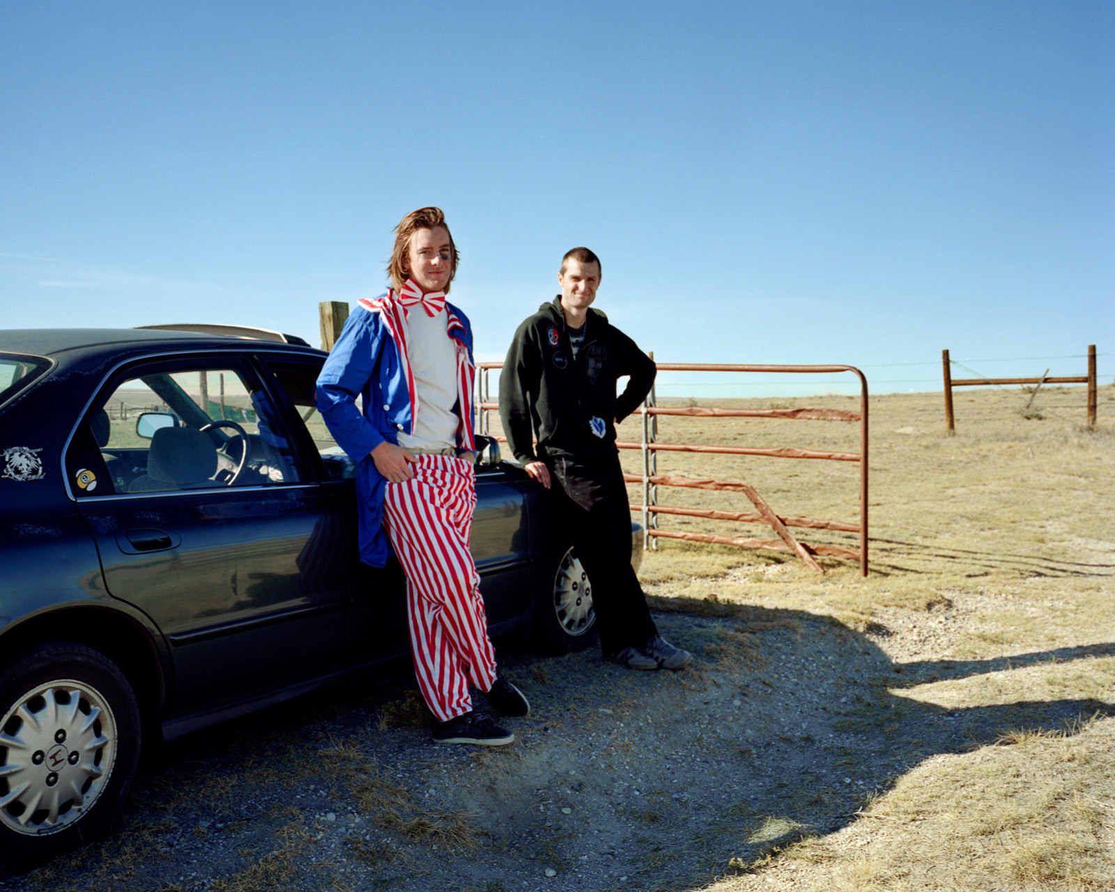 Keota, Colorado, 2012. Chris and Nathan, students at the University of Boulder, in the ghost town of Keota during the set-up for a photographic project about the declining power of the United States of America