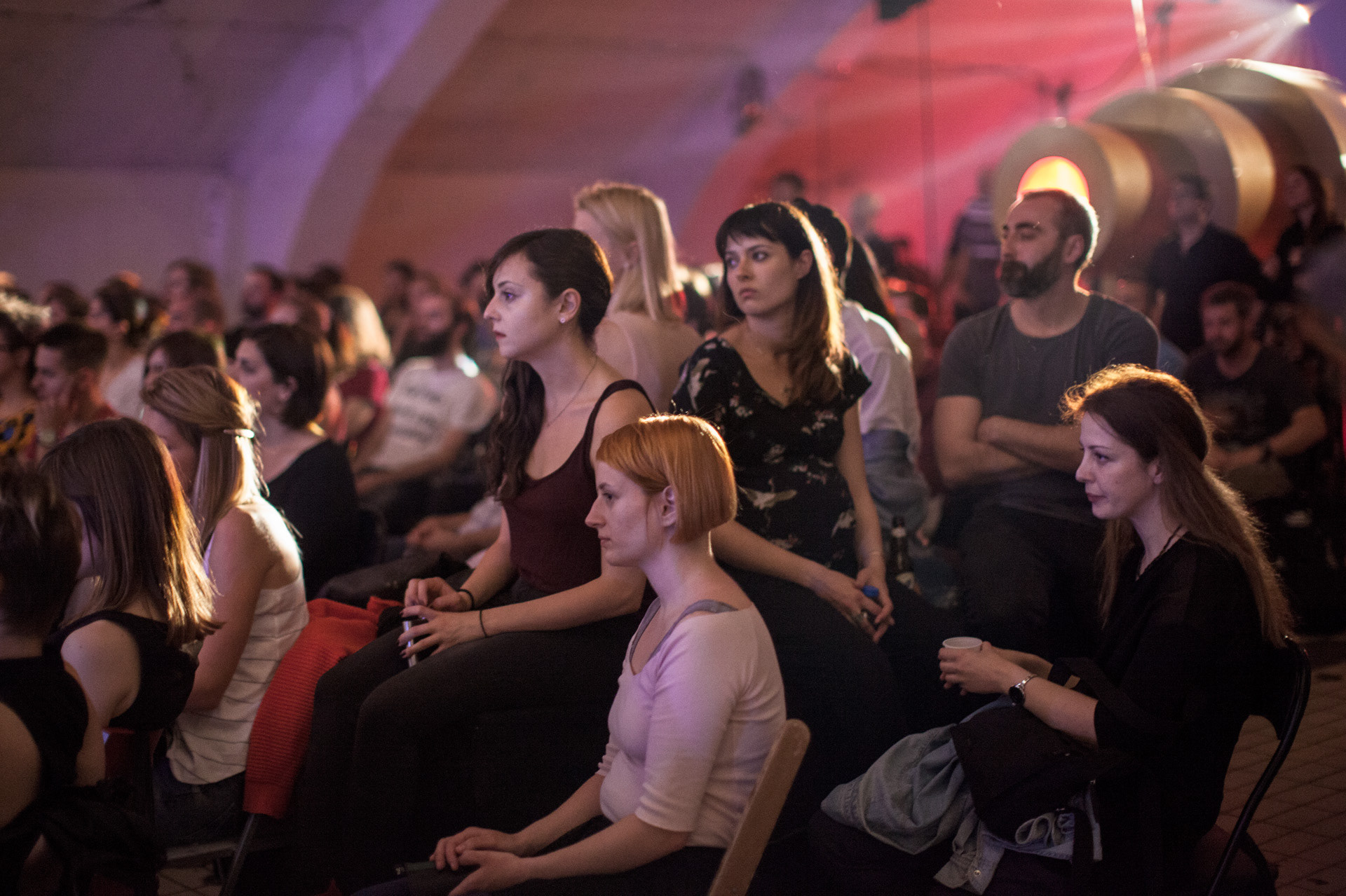Young spectators attending a concert at Drugstore Club