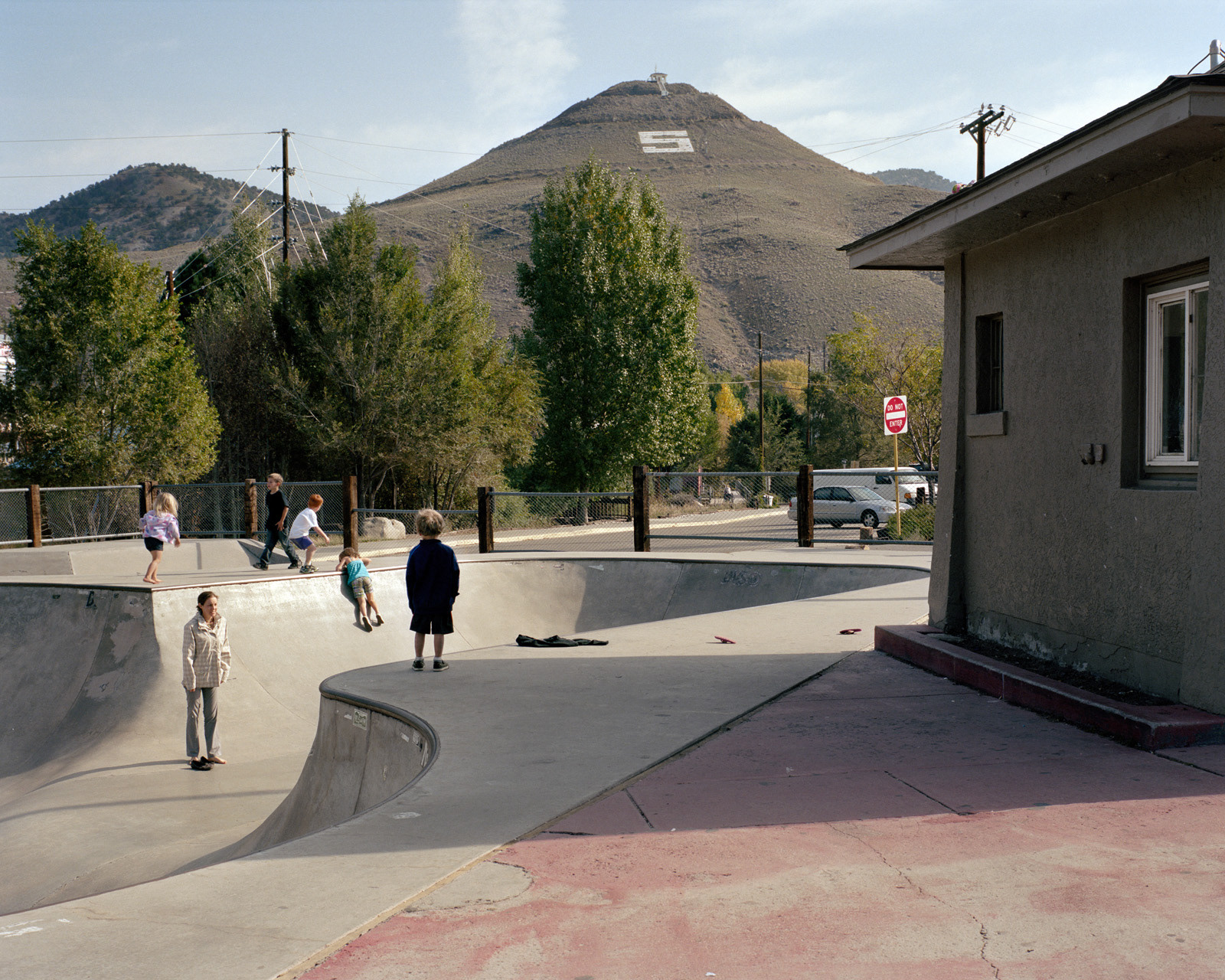 Salida, Colorado, 2012. A skatepark at the foot of the hills surrounding the city of Salida. In the background, the big capital letter on the side of the mountain (in this case an “S” standing for Salida) is a frequent element in the landscape of the West