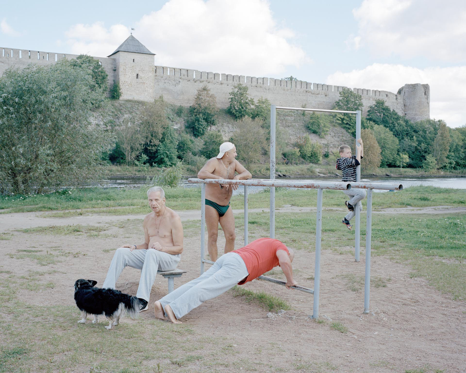 Gymnastics by the river Narva, the natural border between Russia and Estonia