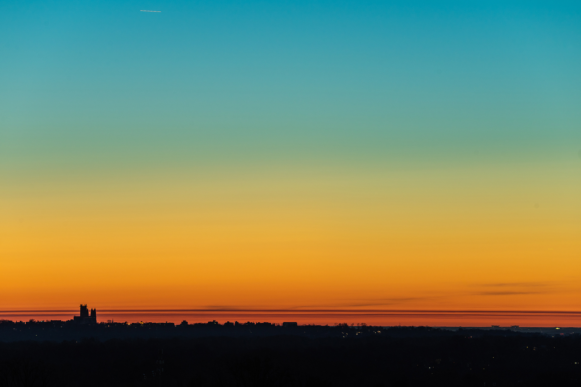 I'm honestly not sure if these horizontal lines are technically stratus cloud layers or some other atmospheric phenomena...