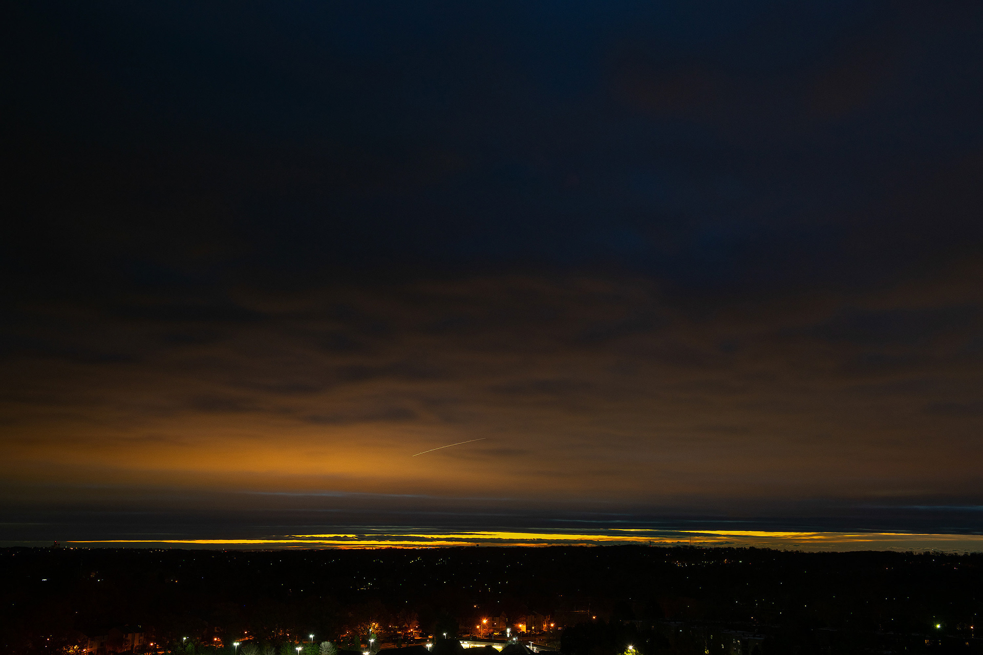 This image and the next are both the light of DC illuminating low-hanging cloud cover. I can't seem to find a name for this, but it's so common it feels like it should have a name. I saw it all the time. 