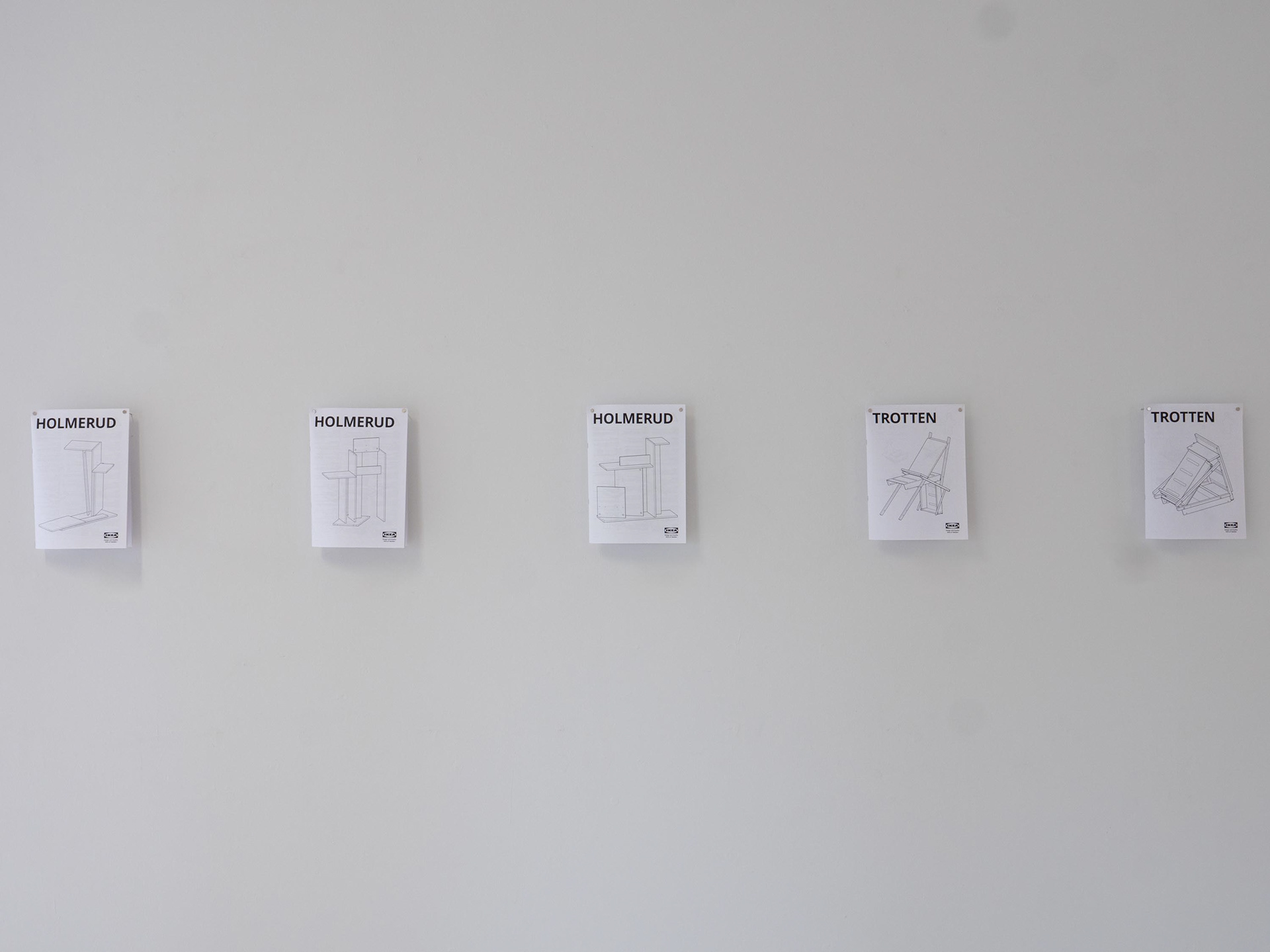 Exhibition view featuring IKEA instruction drawings 
