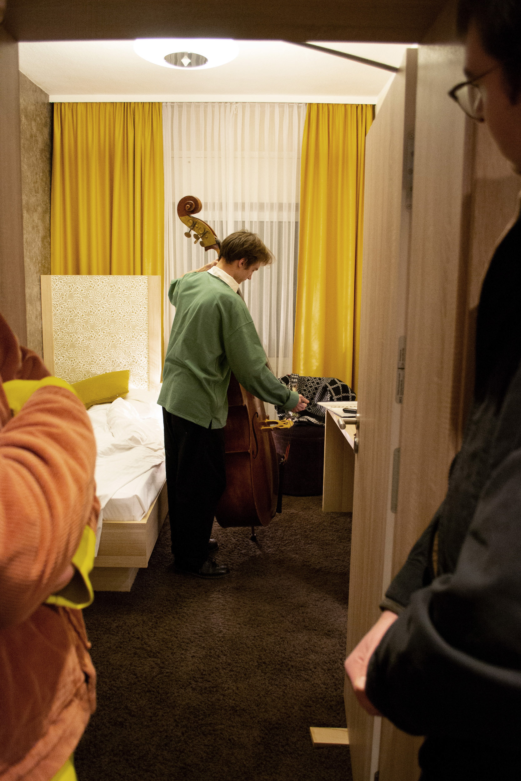 Solo, 2023, performance featuring four musicians performing in separate rooms.