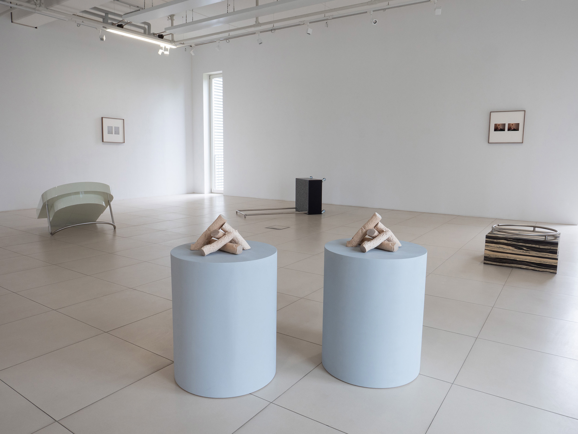 FeuerFeuer, 2026, pair of sculptures made of spruce wood, poplar wood and MDF.