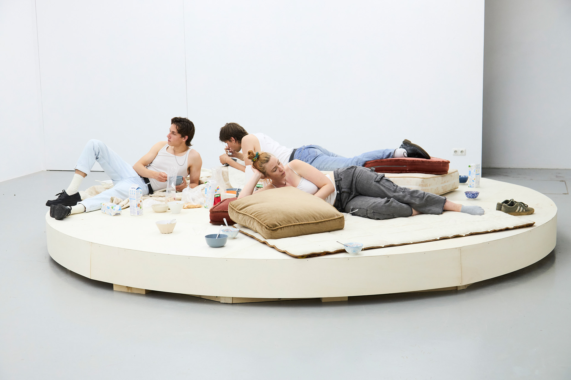 Choose Life, 2021, installation with people eating cereal on a rotating platform.