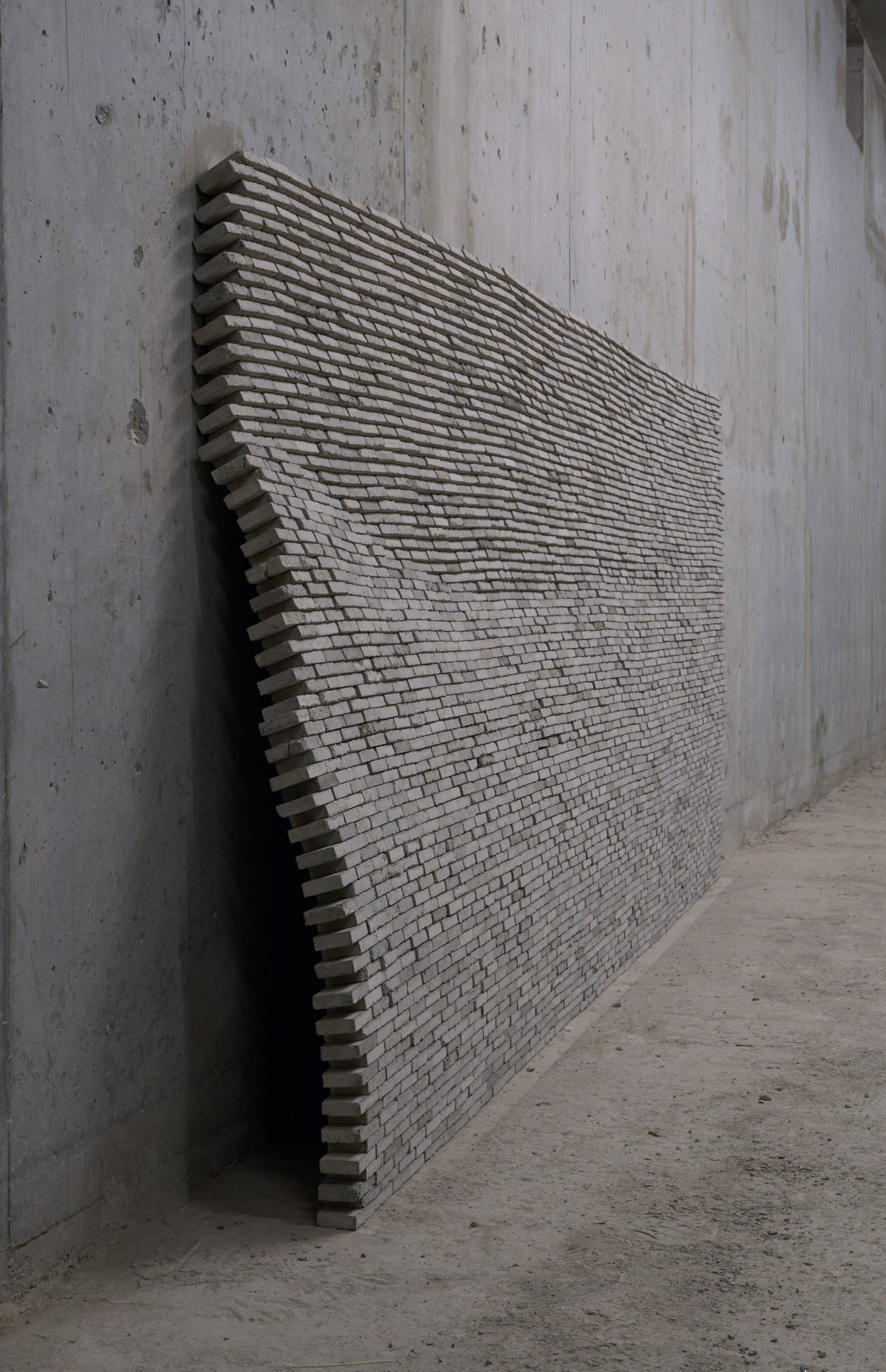 Wall, 2020, installation by Philipp Neßler made of concrete blocks.