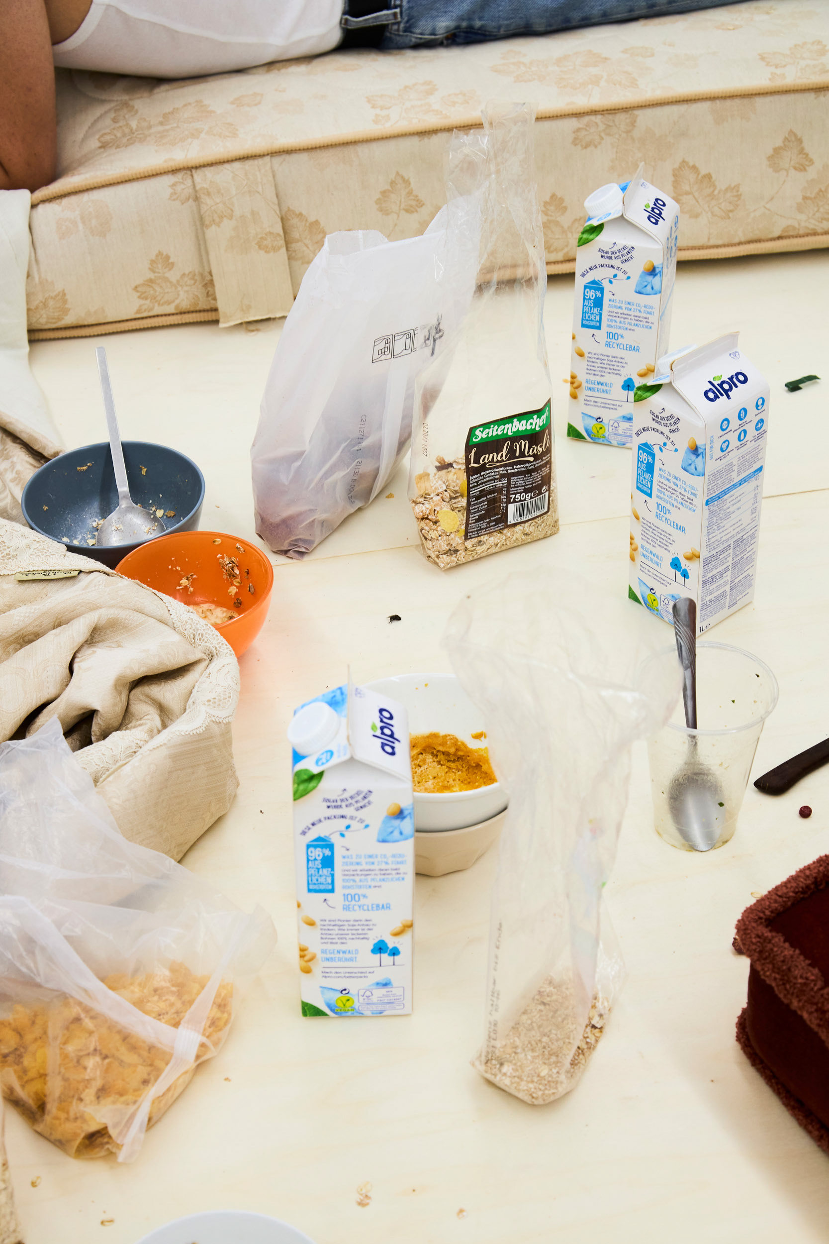 Choose Life, 2021, installation with people eating cereal on a rotating platform.