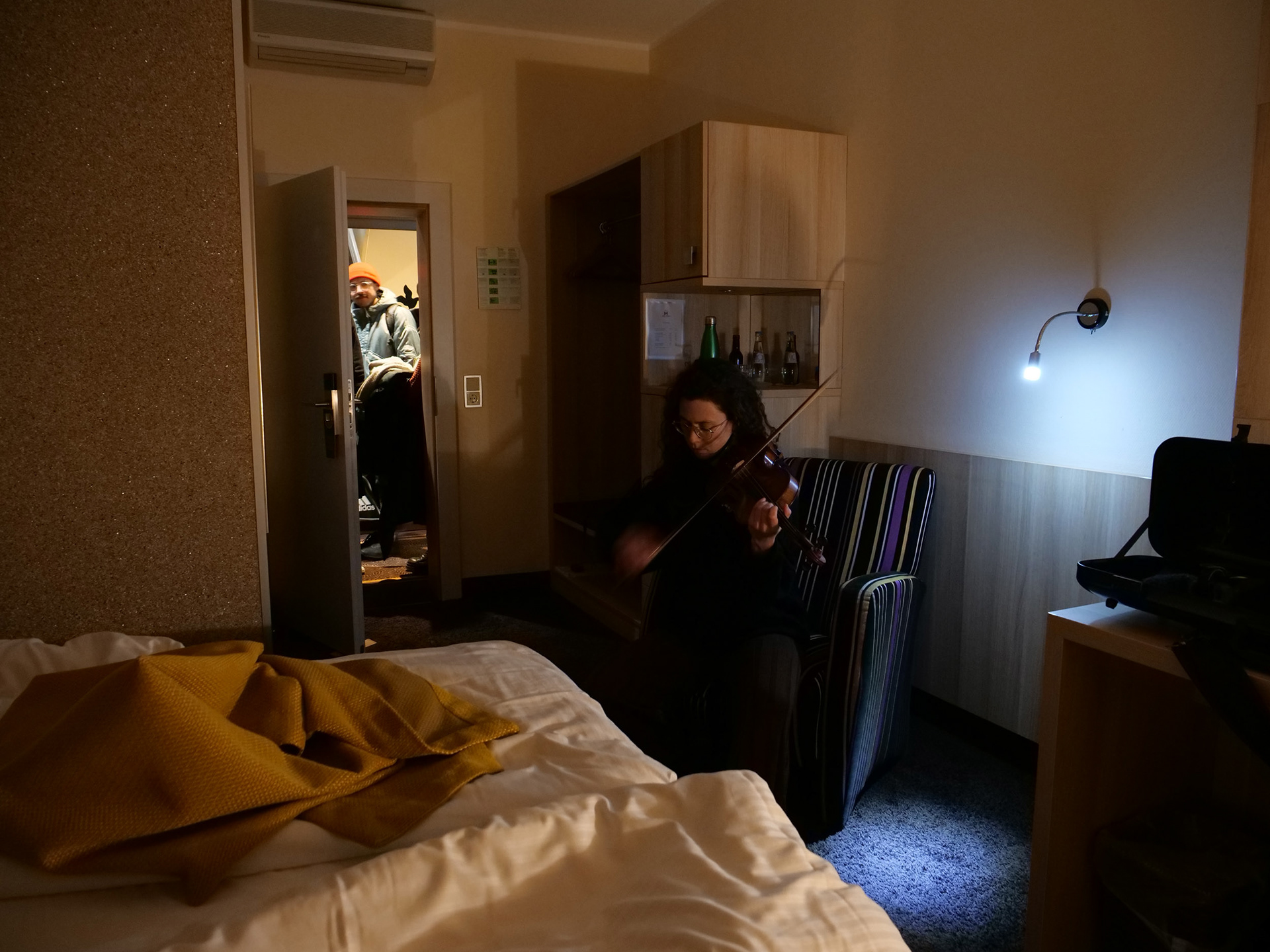 Solo, 2023, performance featuring four musicians performing in separate rooms.