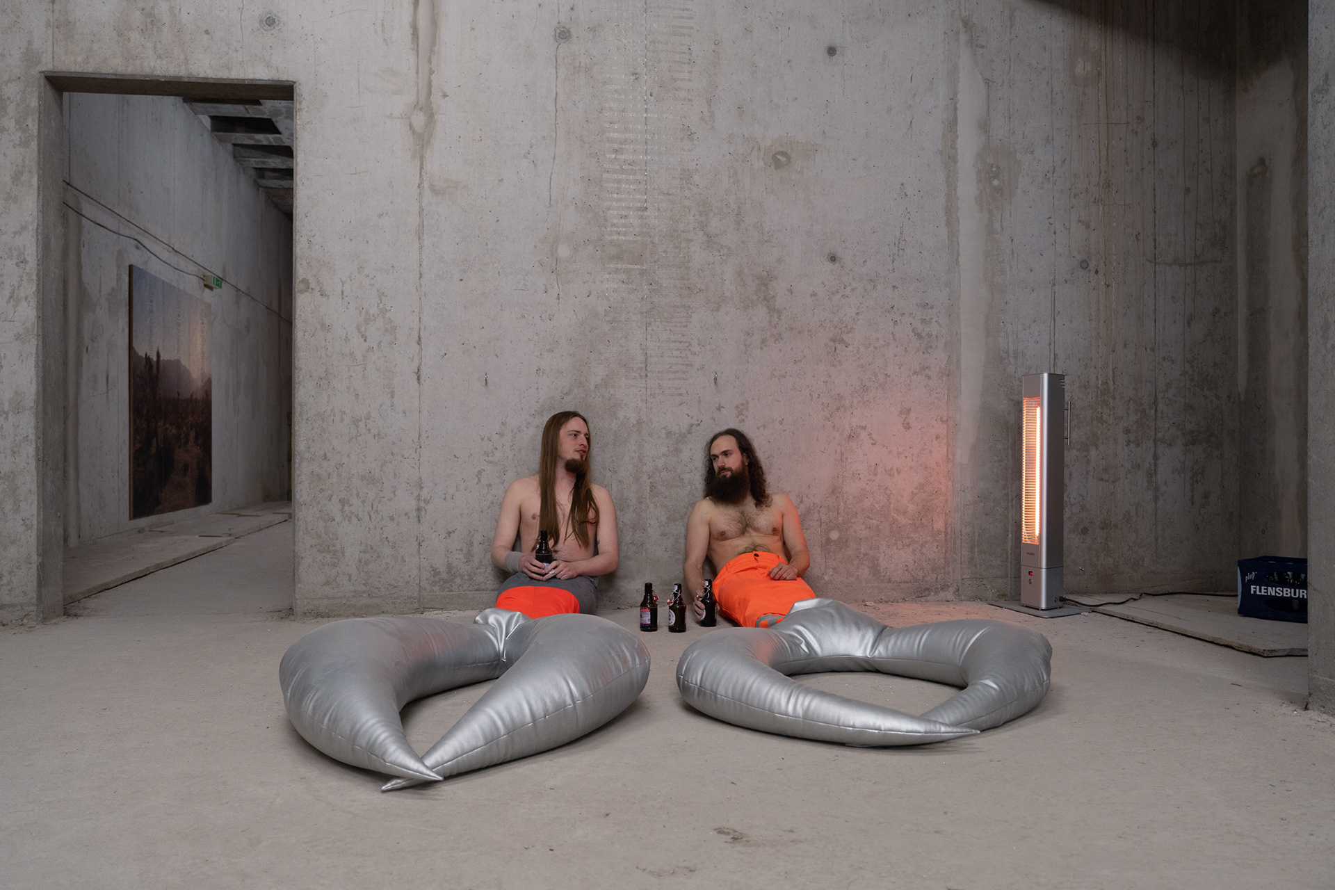 Baustellenidylle, 2020, performance by Julia Seifried featuring construction worker pants, fabric and beer.