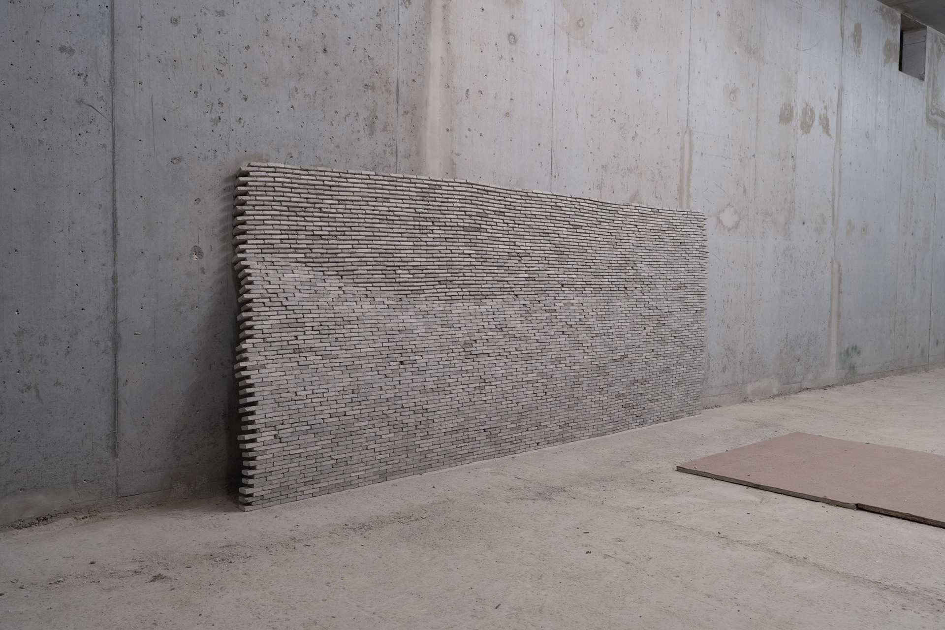 Wall, 2020, installation by Philipp Neßler made of concrete blocks.