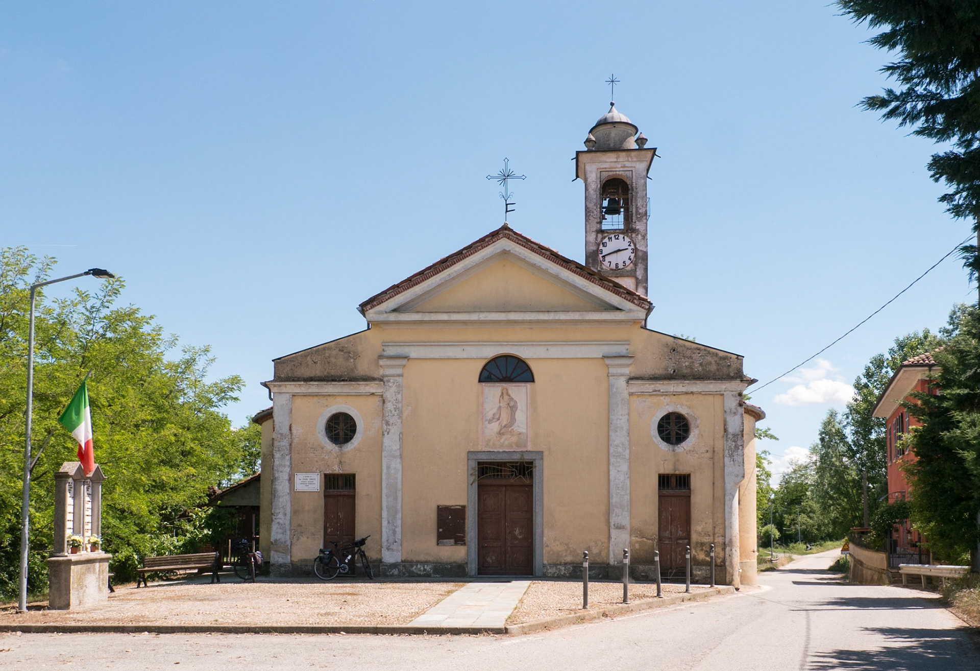 We stopped in the shade of this church to nibble on  strawberries [Case del Bosco, Piemonte, Italy]